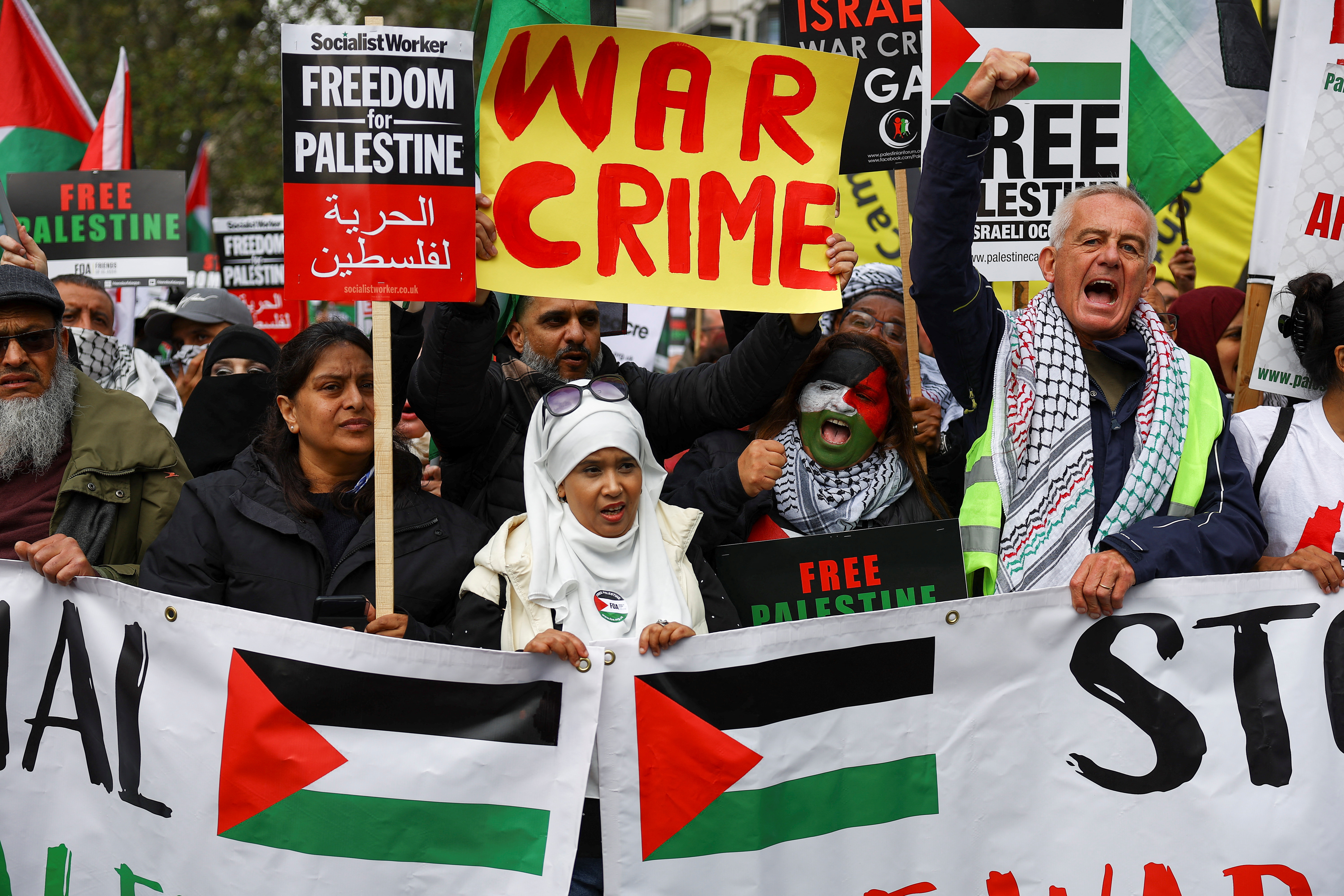 Demonstrators protest in solidarity with Palestinians in Gaza, in London