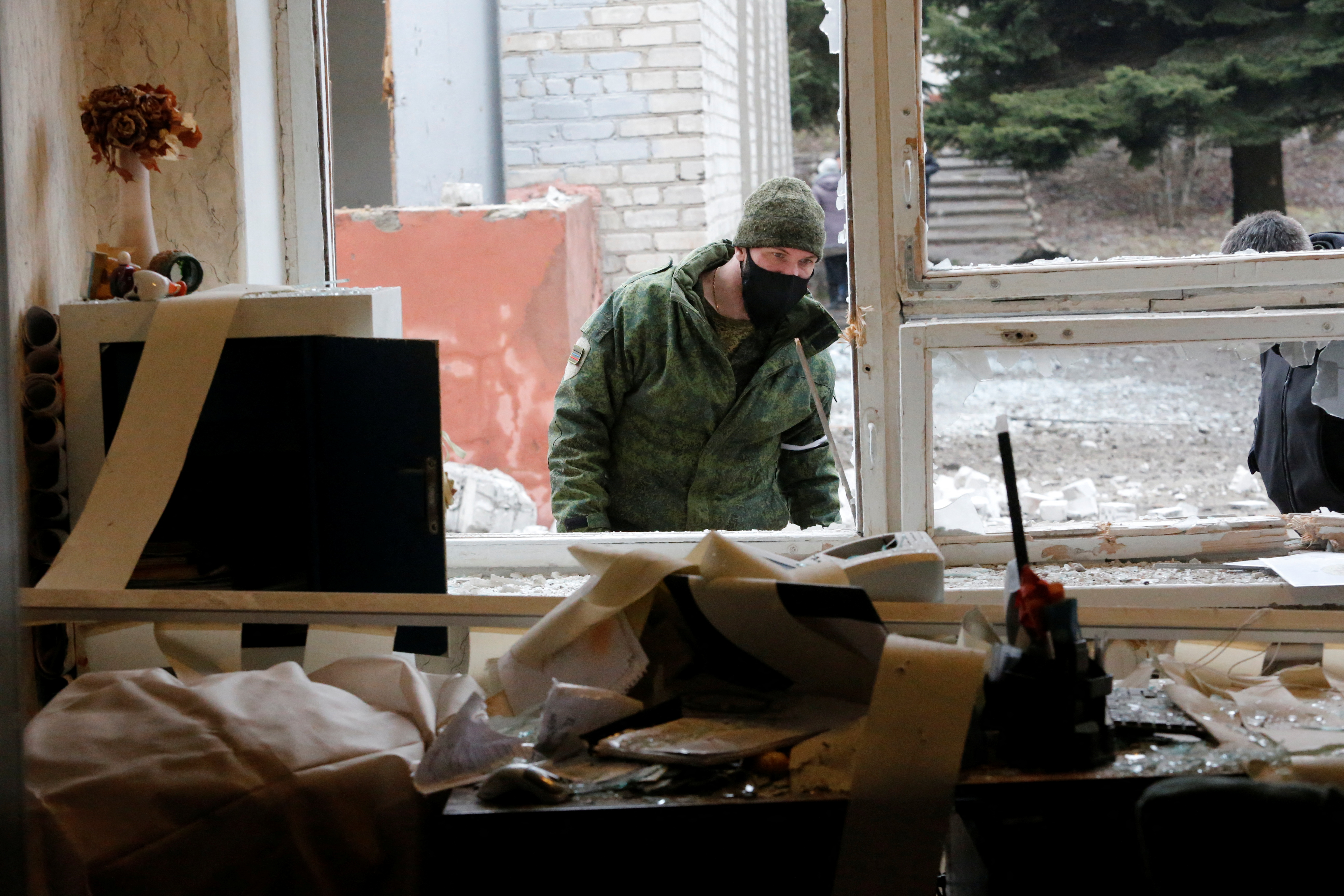 A view shows a damaged school building in the Donetsk region