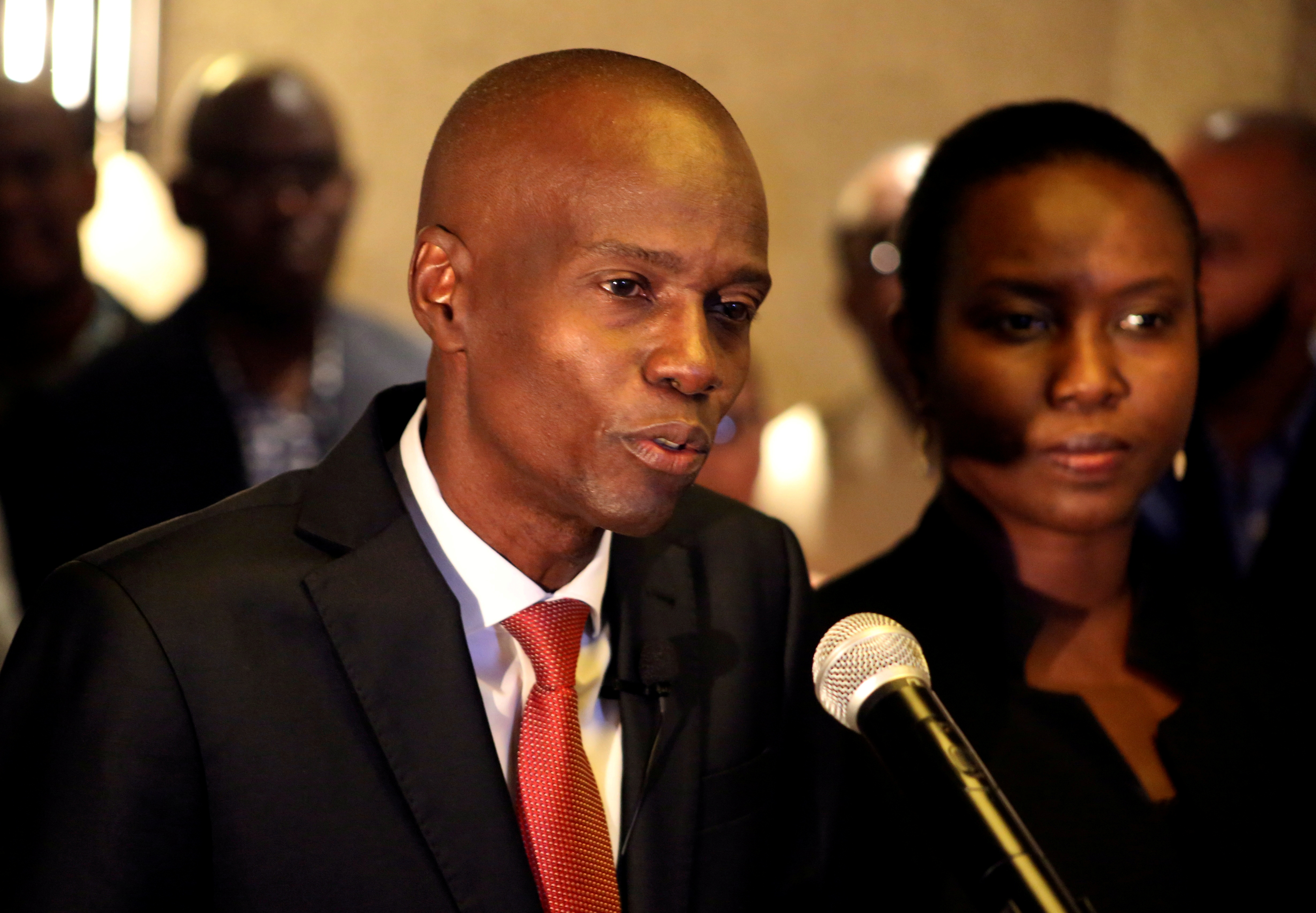 Jovenel Moise addresses the media next to his wife Martine after winning Haiti's 2016 presidential election