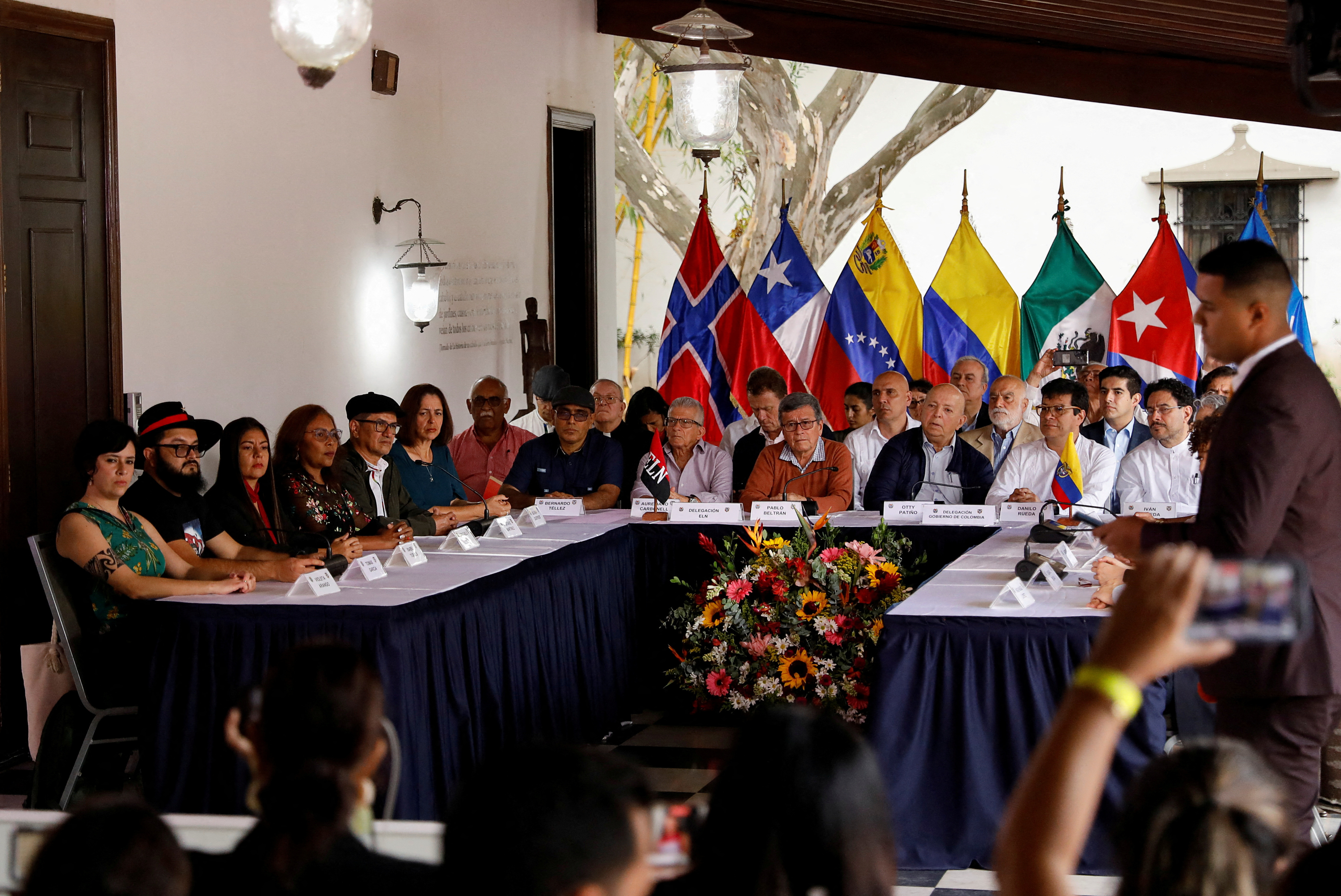 Colombia's government negotiators and National Liberation Army (ELN) members hold a news conference, in Caracas