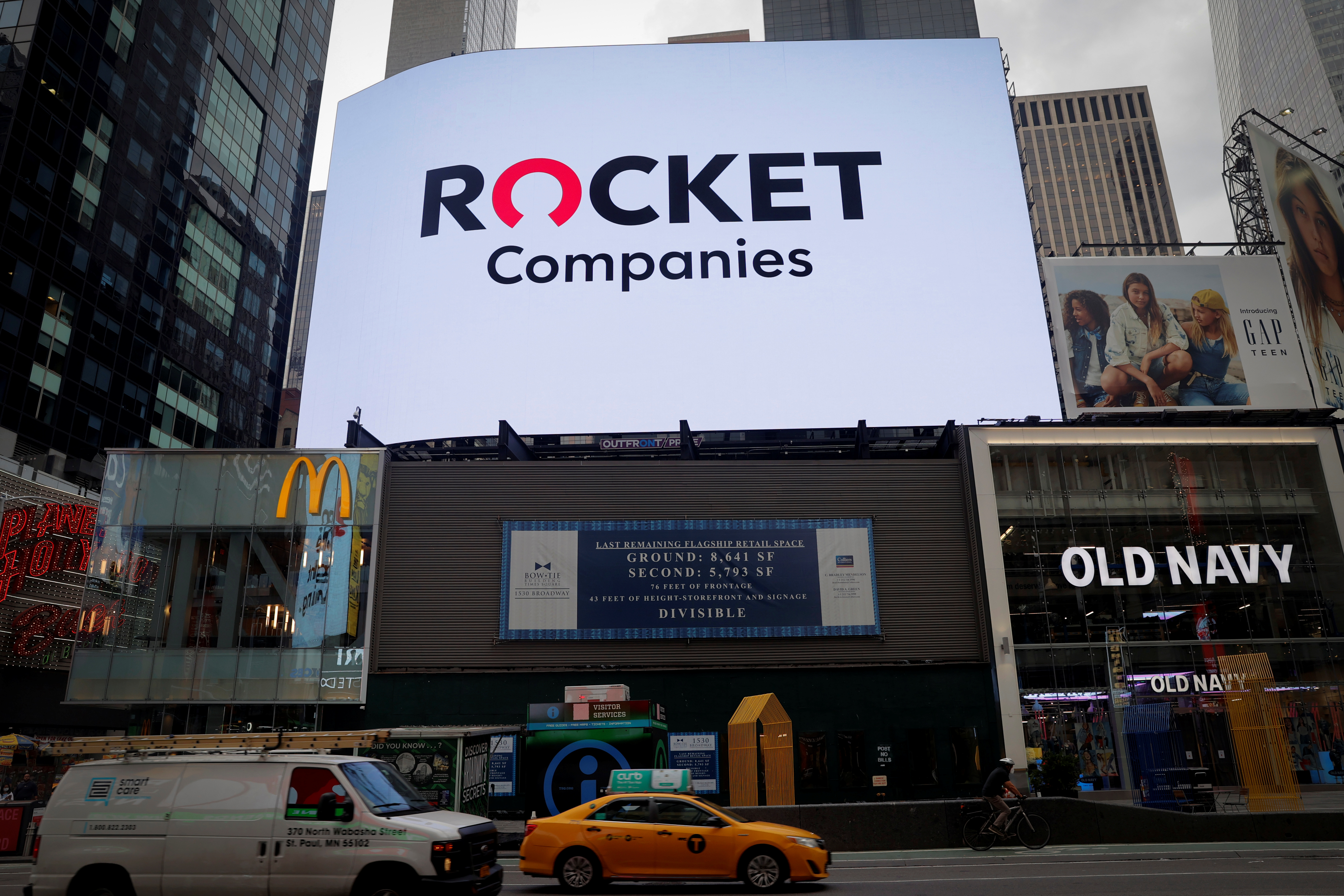 Screen displays the logo of Rocket Companies (RKT) in Times Square during the company's IPO in New York