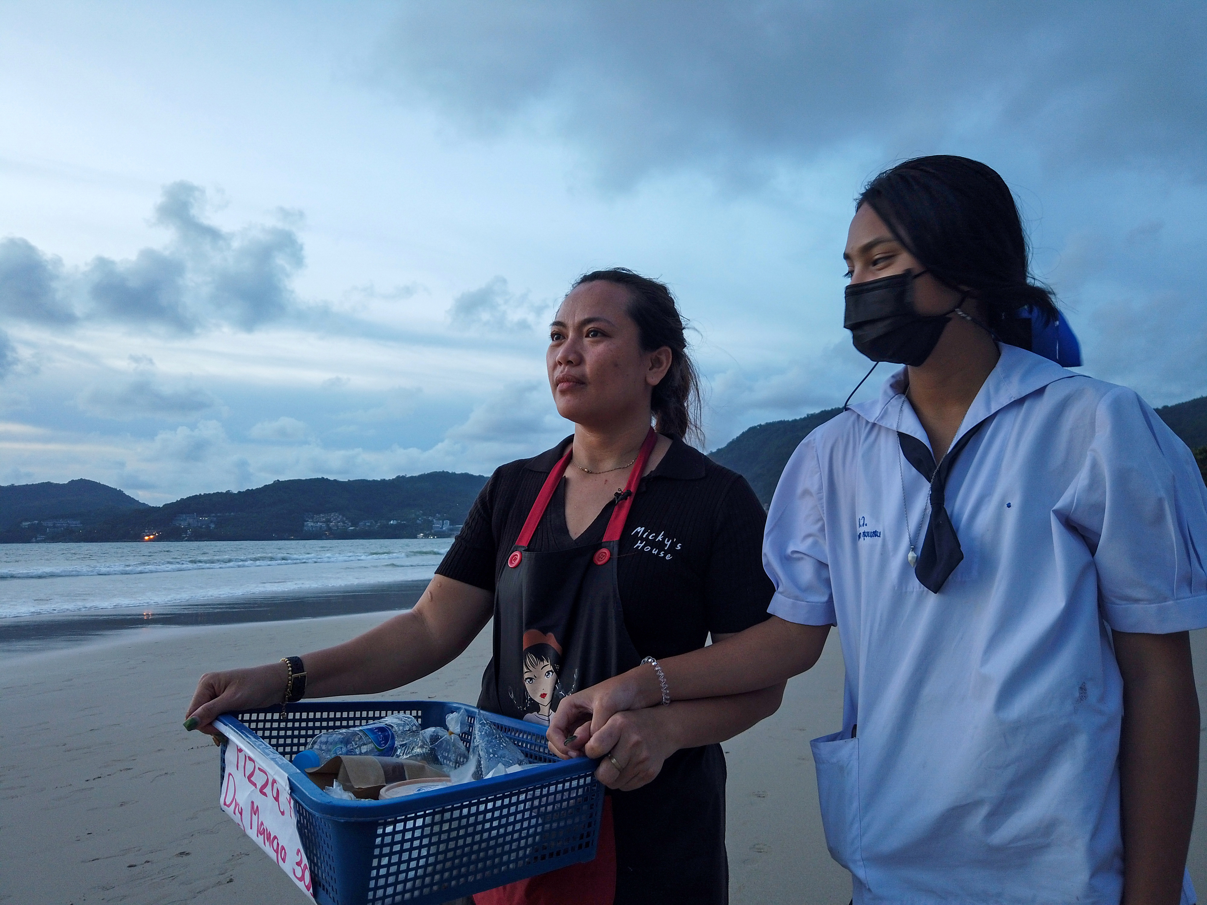 Pimonta sells food on the beach while waiting for the reopening of Phuket