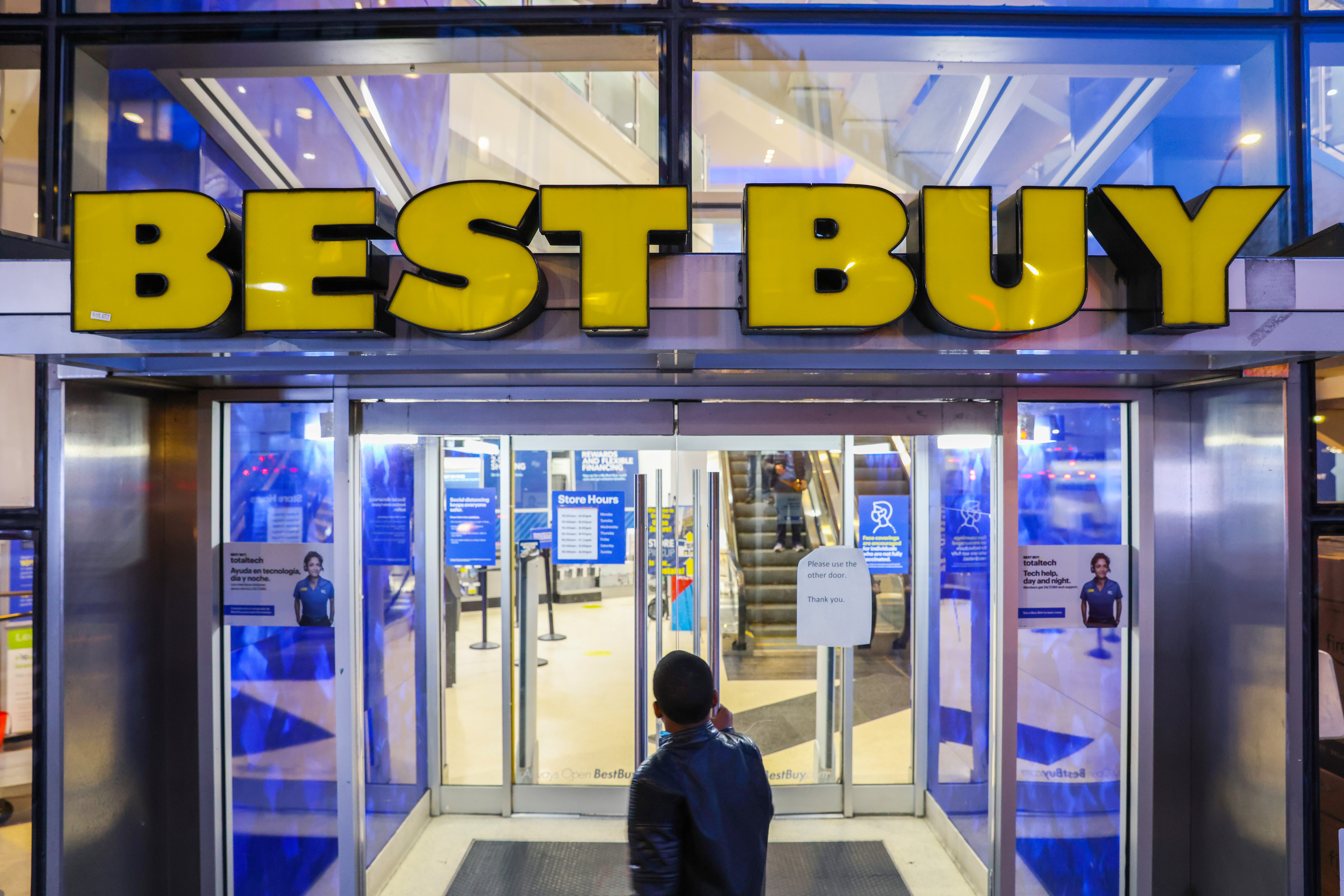 A person enters a Best Buy store in Manhattan, New York City
