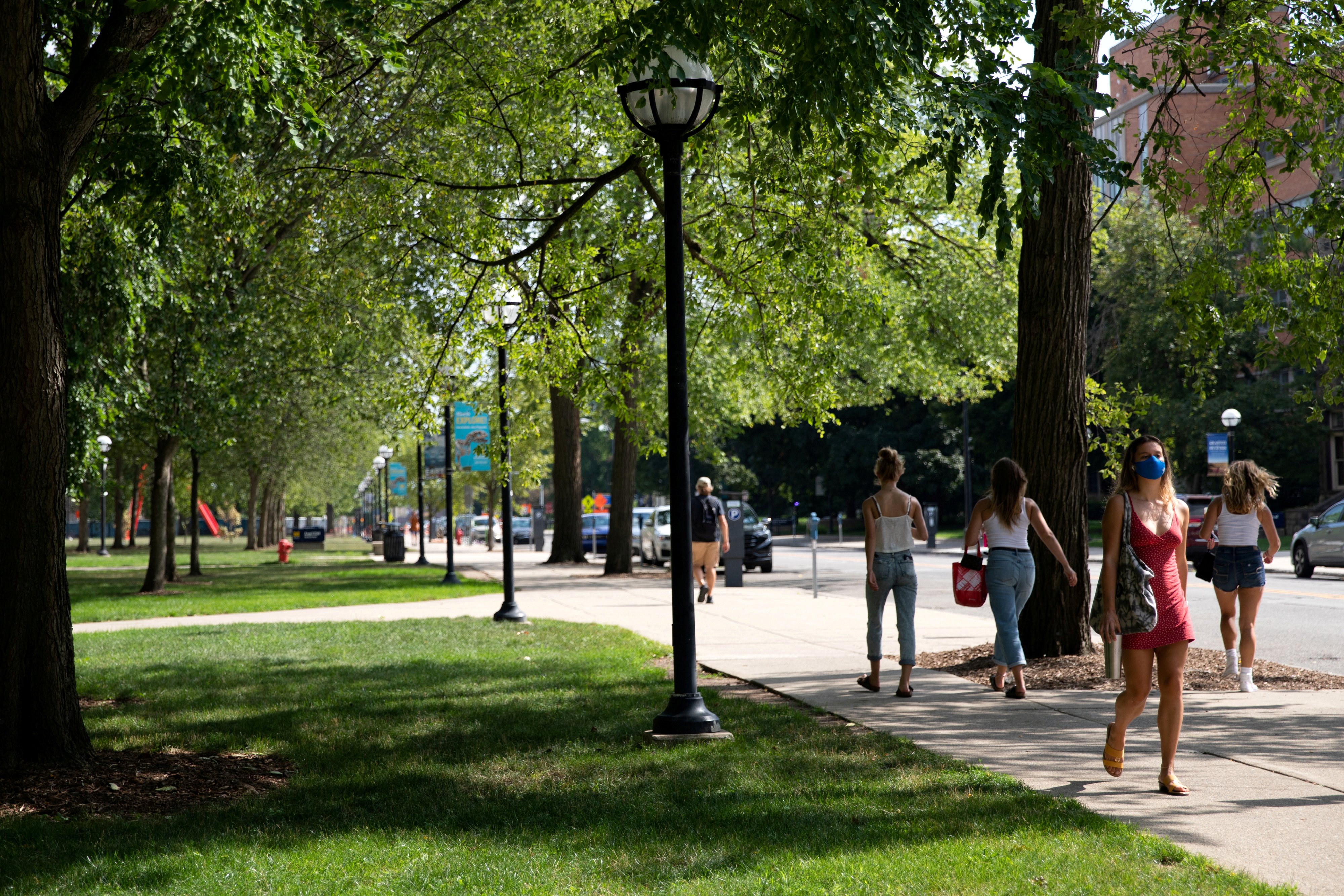Students walk through the University of Michigan campus in Ann Arbor
