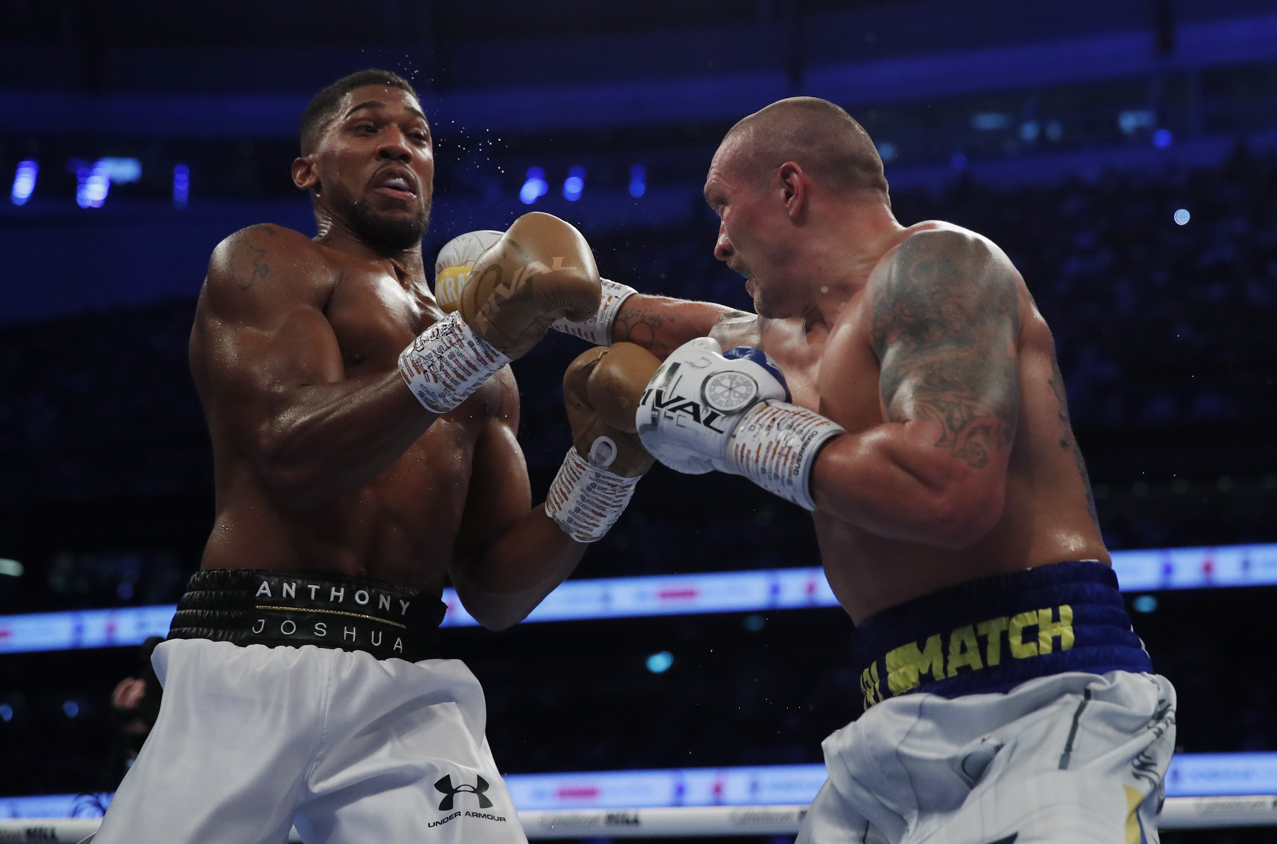 Usyk outclasses Joshua to claim world heavyweight titles | Reuters