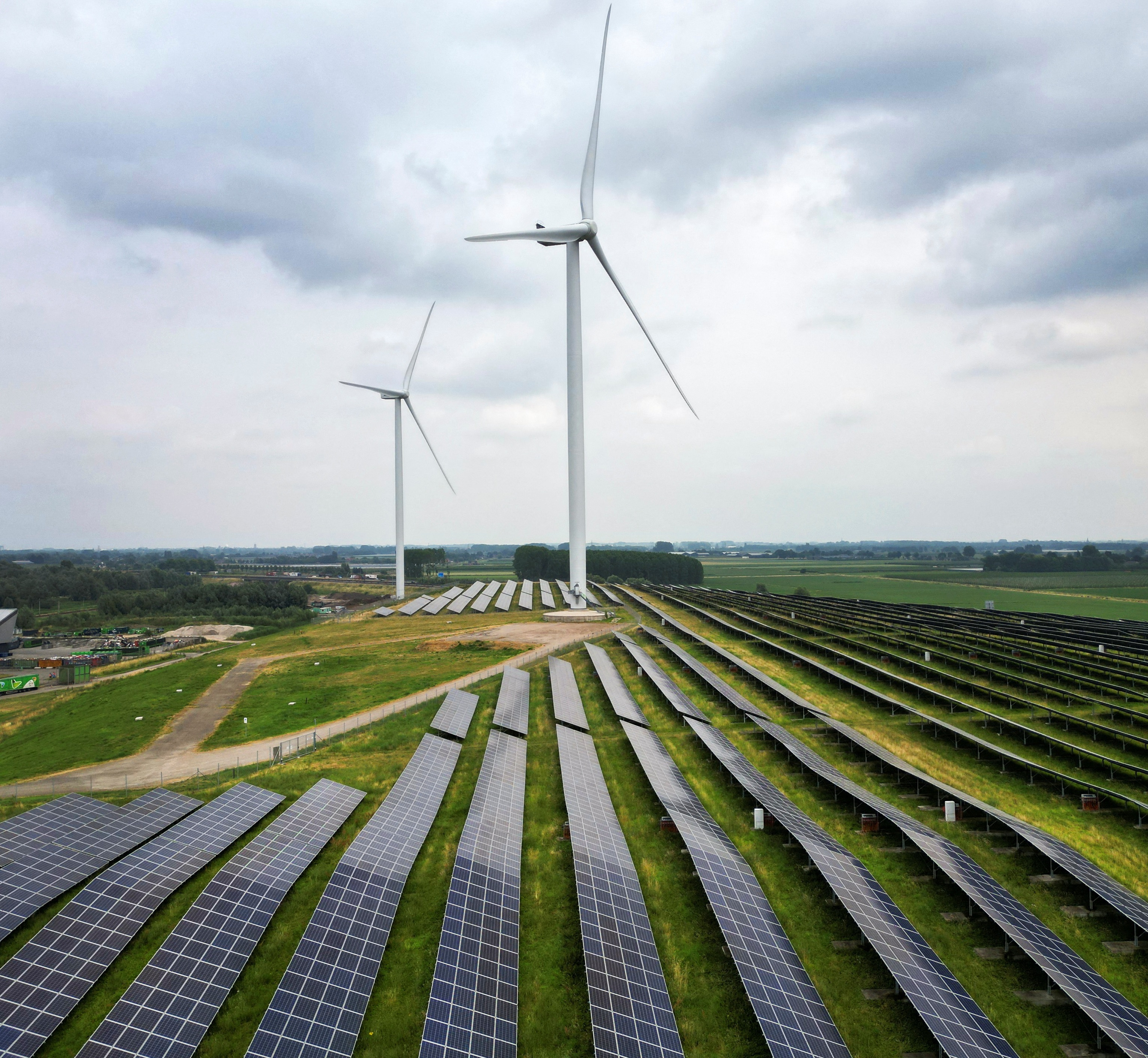A solar panel park and wind turbines are seen in Geldermalsen, Netherlands.