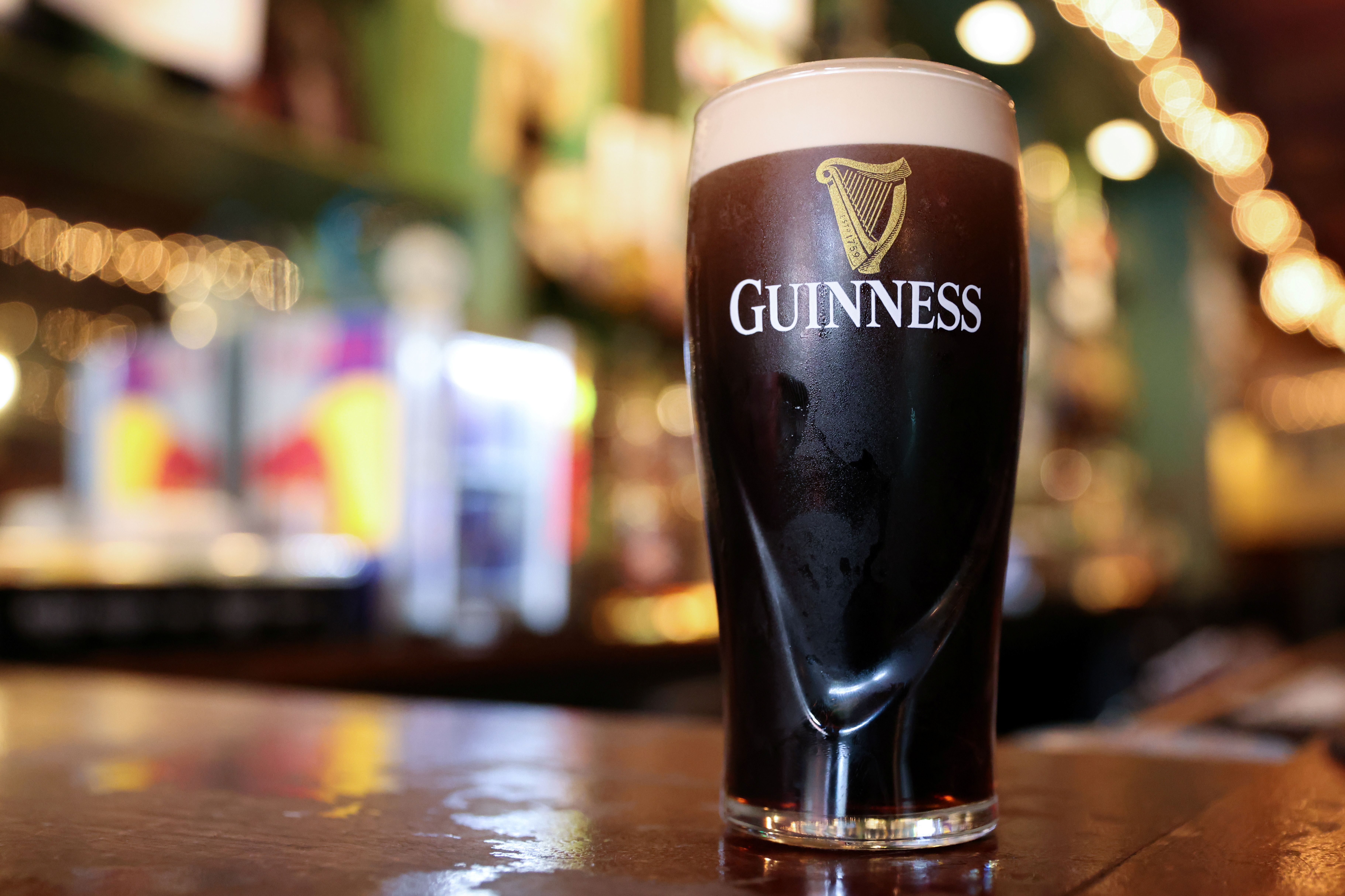 A pint of Guinness beer, a brand of Diageo, is seen in this photo illustration
