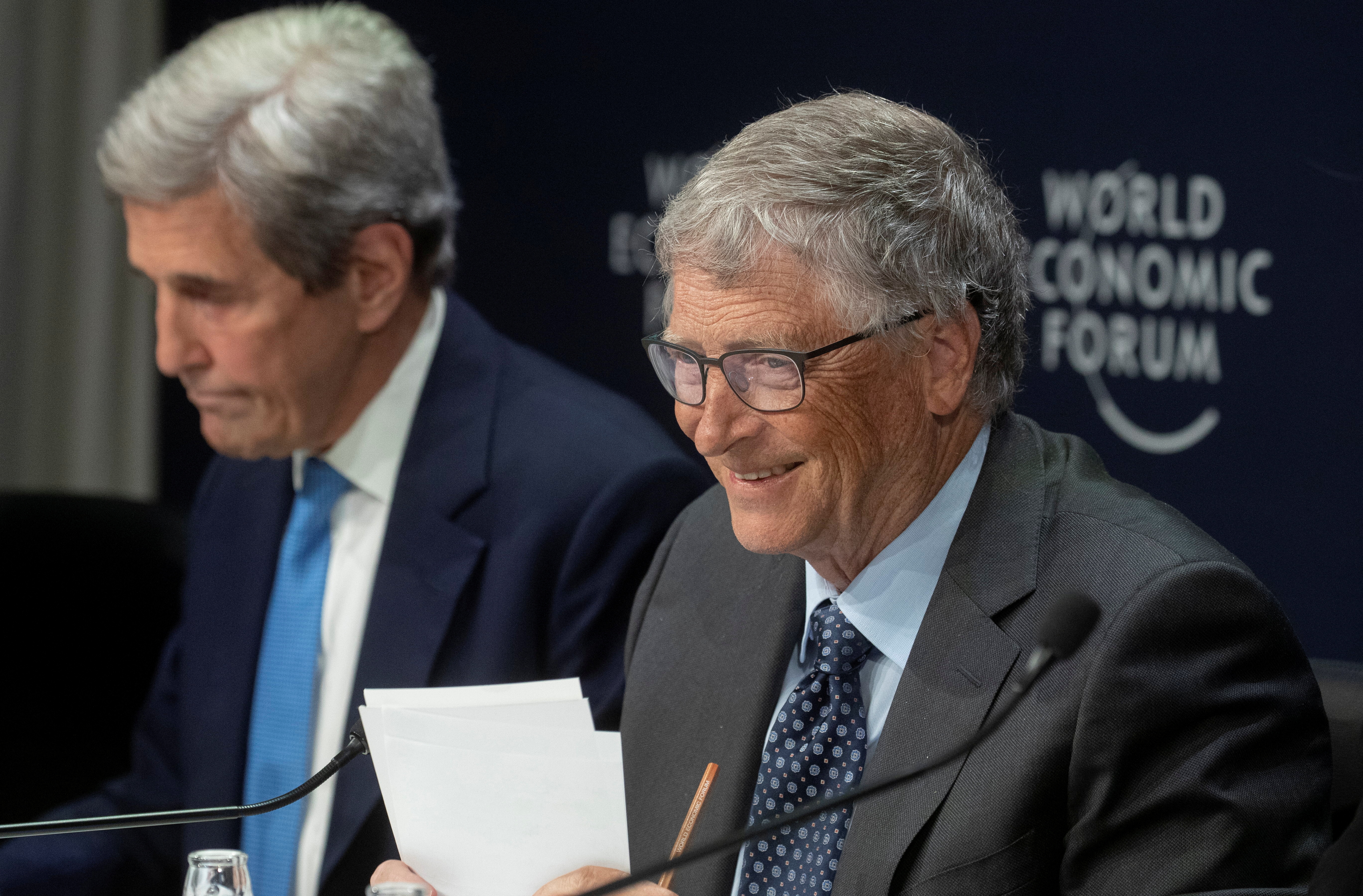 U.S. climate envoy Kerry and Bill Gates, attend a news conference in Davos