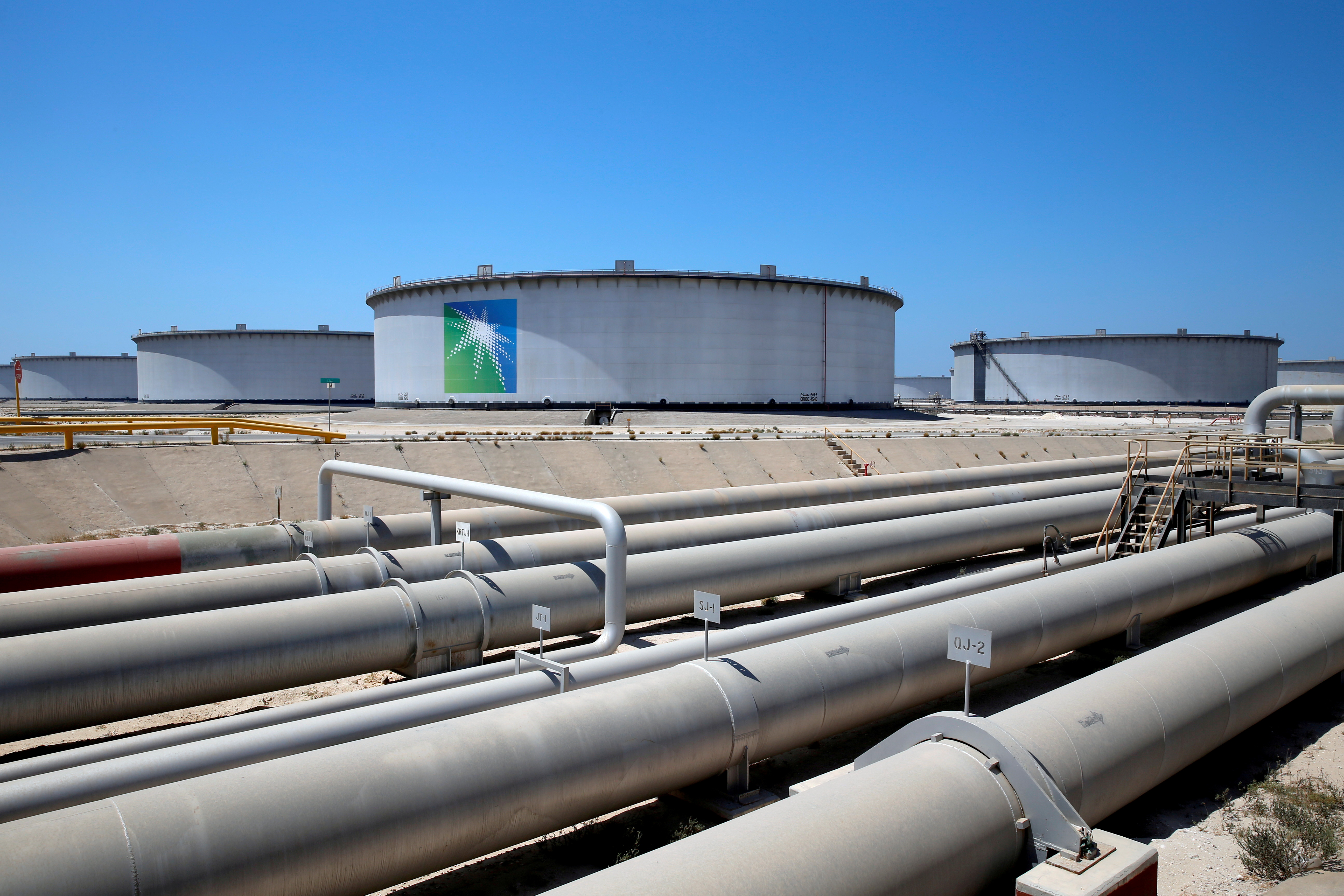 General view of Aramco tanks and oil pipe at Saudi Aramco's Ras Tanura oil refinery and oil terminal