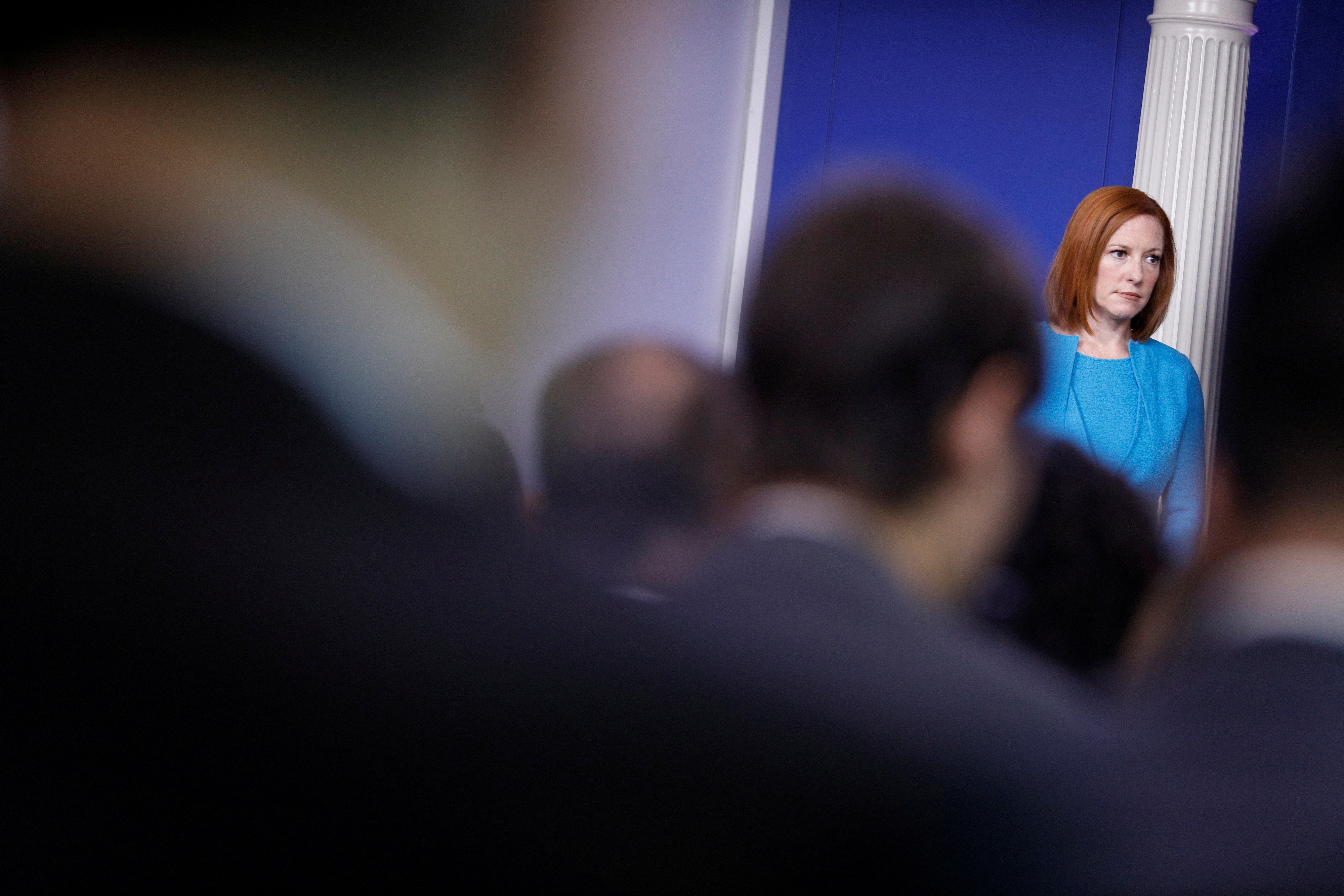 White House Press Secretary Jen Psaki looks on as United States Surgeon General Vivek Murthy delivers remarks during a news conference at the White House in Washington, U.S., July  15, 2021. REUTERS/Tom Brenner