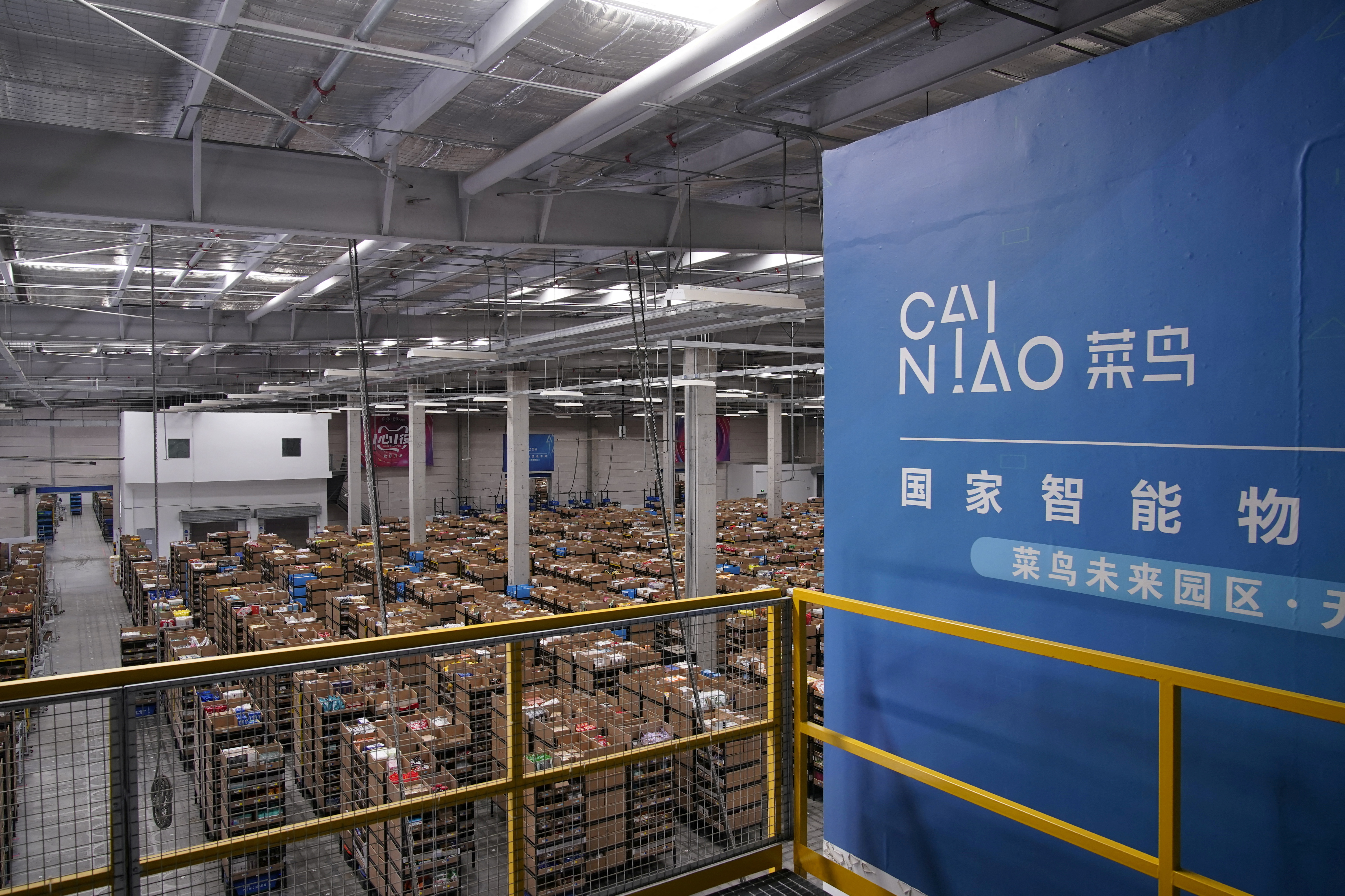 Cainiao's logo, Alibaba's logistics unit, is seen at the warehouse in Wuxi