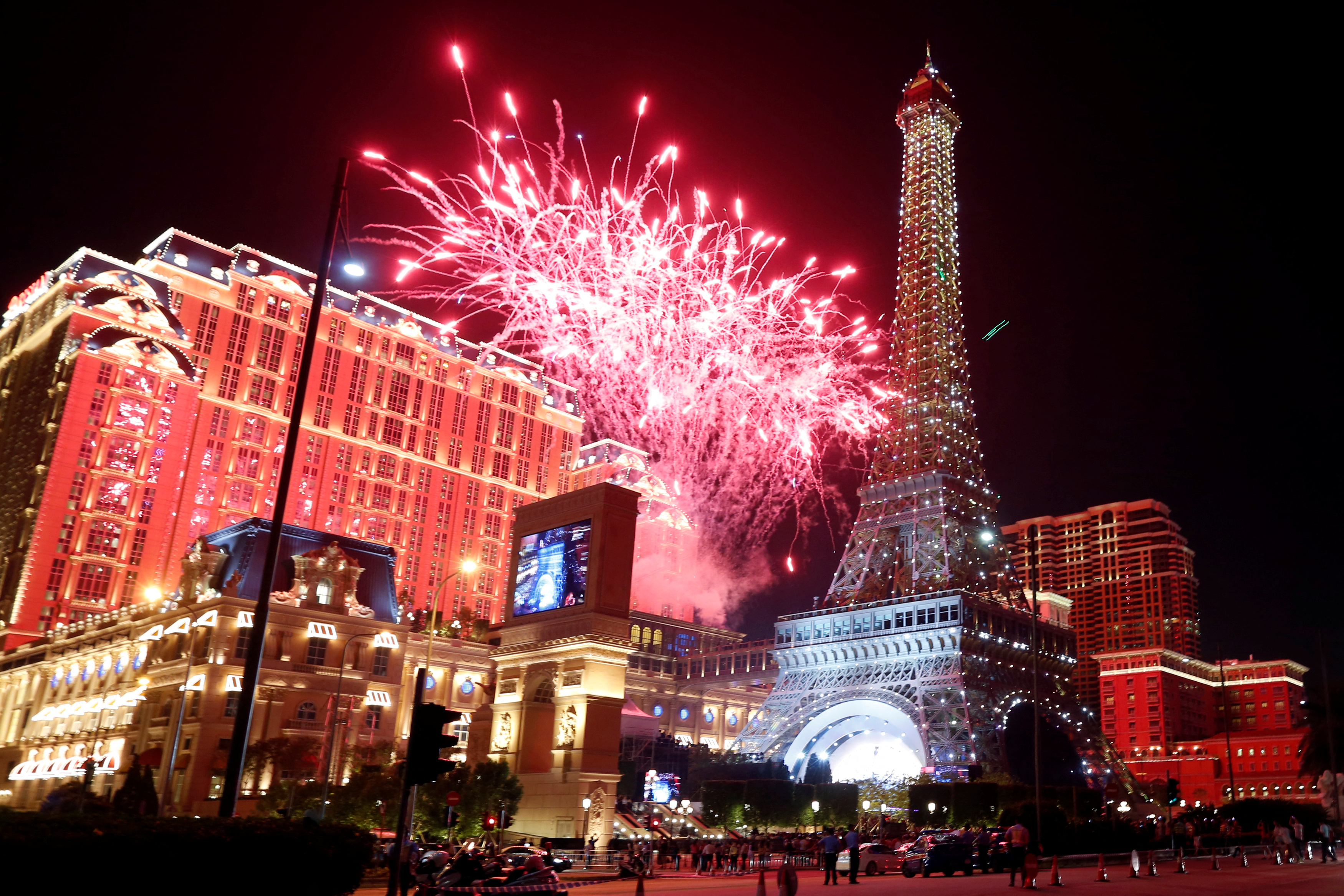 Fireworks explode over Parisian Macao as part of the Las Vegas Sands development during its opening ceremony in Macau