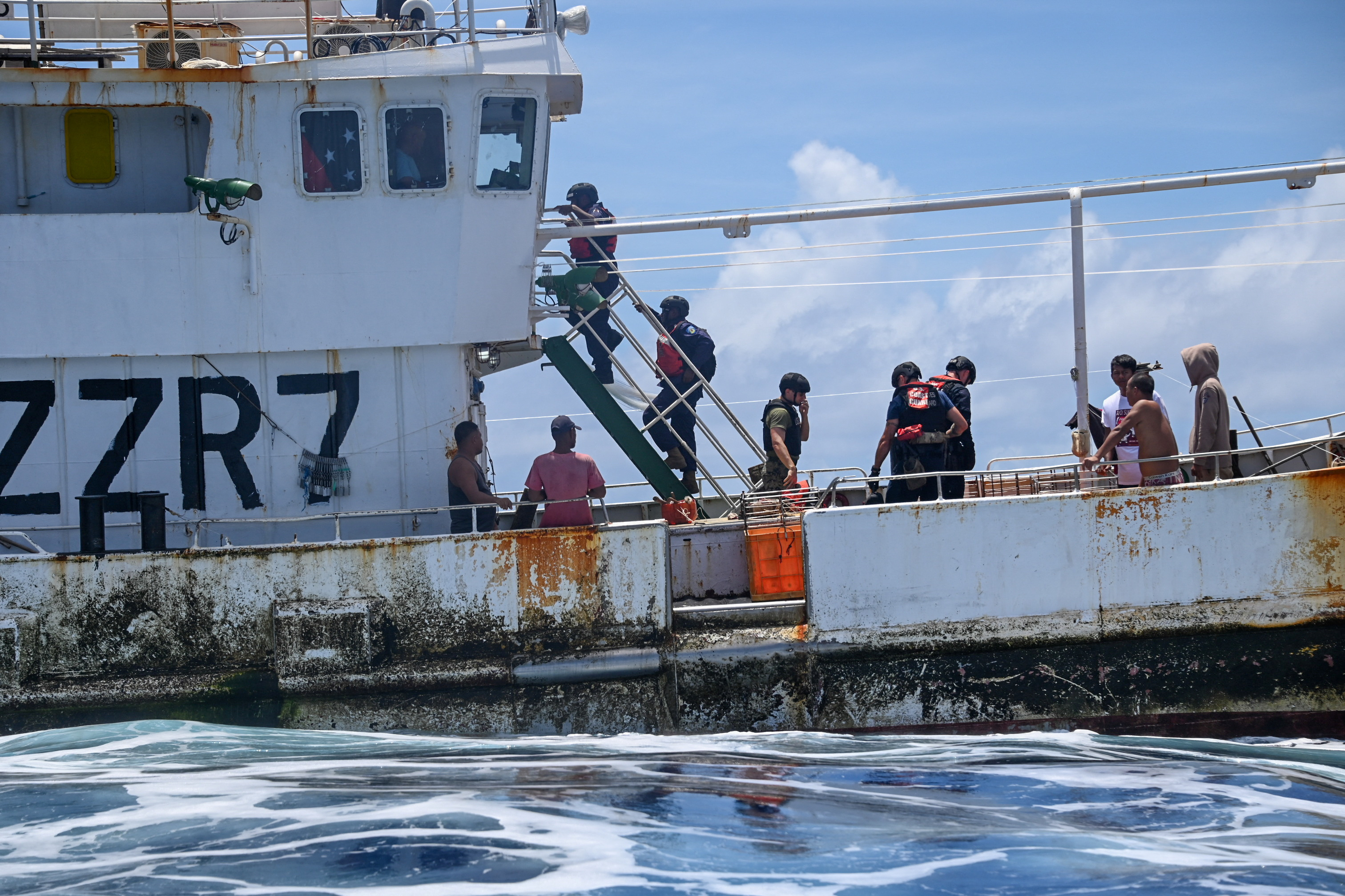 U.S. Coast Guard Cutter Harriet Lane, boarding team alongside Vanuatu Fishery Department and Police Maritime Wing officers to conduct fishery boardings