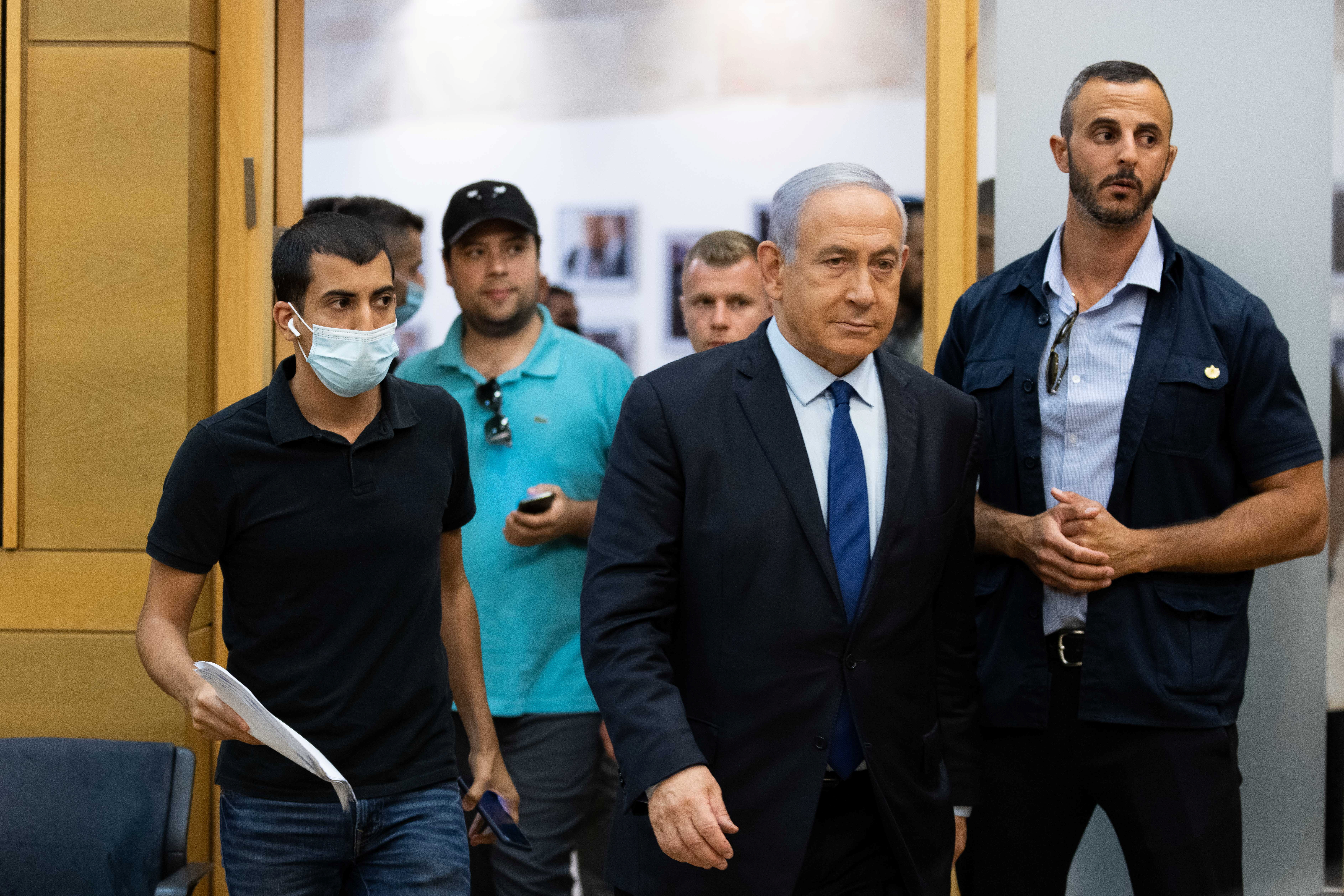Israeli Prime Minister Benjamin Netanyahu arrives to deliver a statement in the Knesset, the Israeli Parliament, in Jerusalem