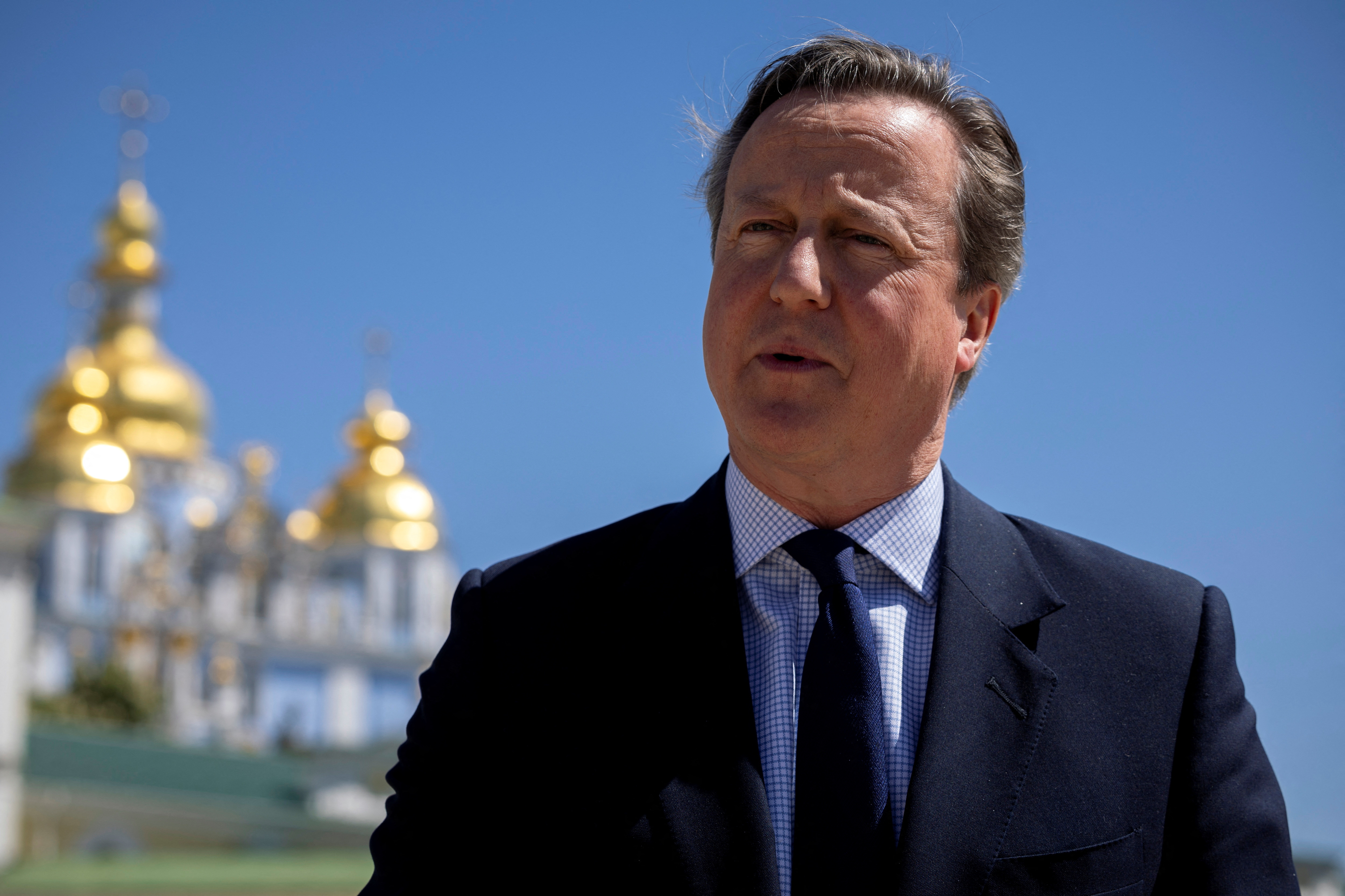 Britain's Foreign Secretary David Cameron and Ukrainian Foreign Minister Dmytro Kuleba meet in Kyiv