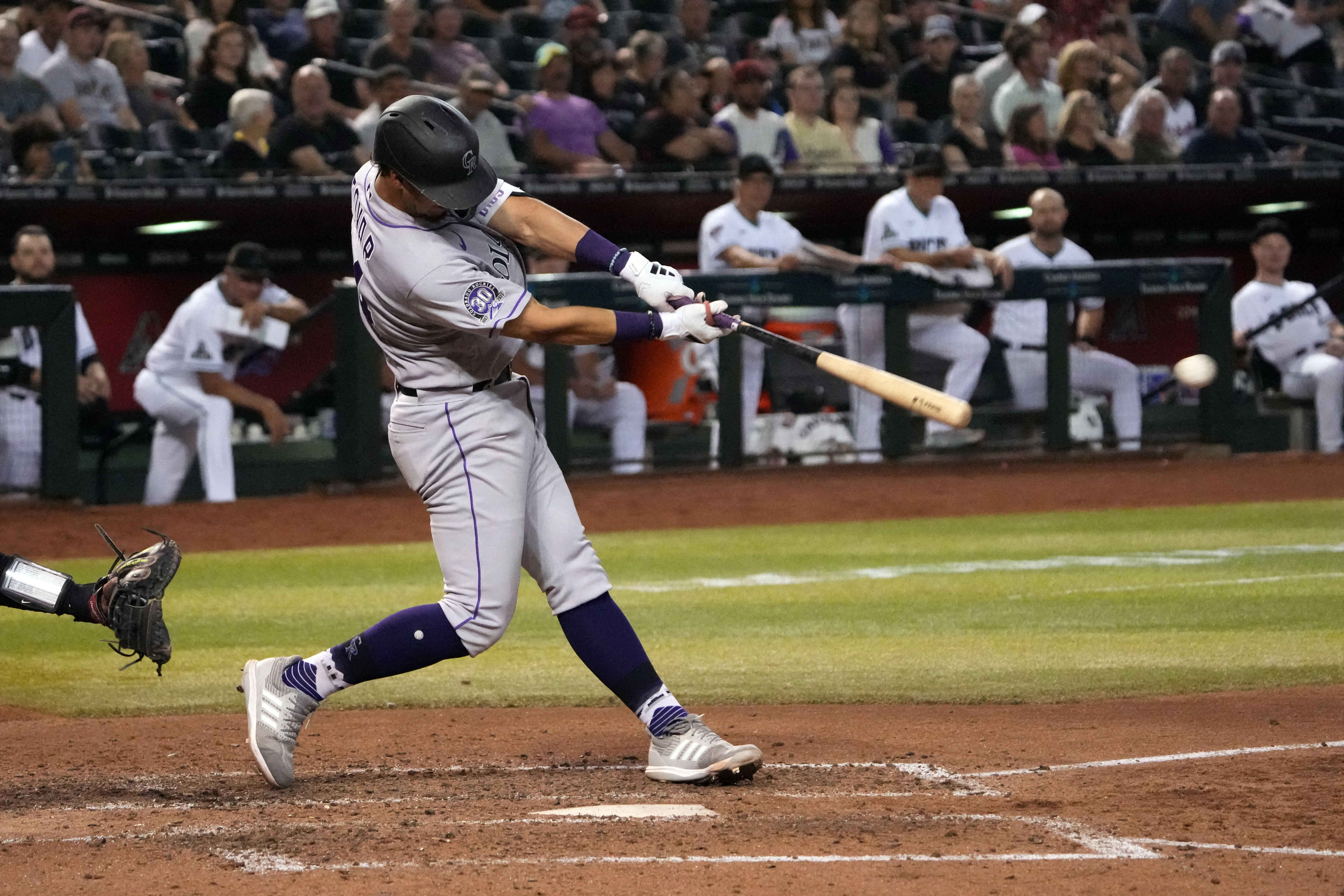 Arizona Diamondbacks' Zac Gallen walks to the dugout after