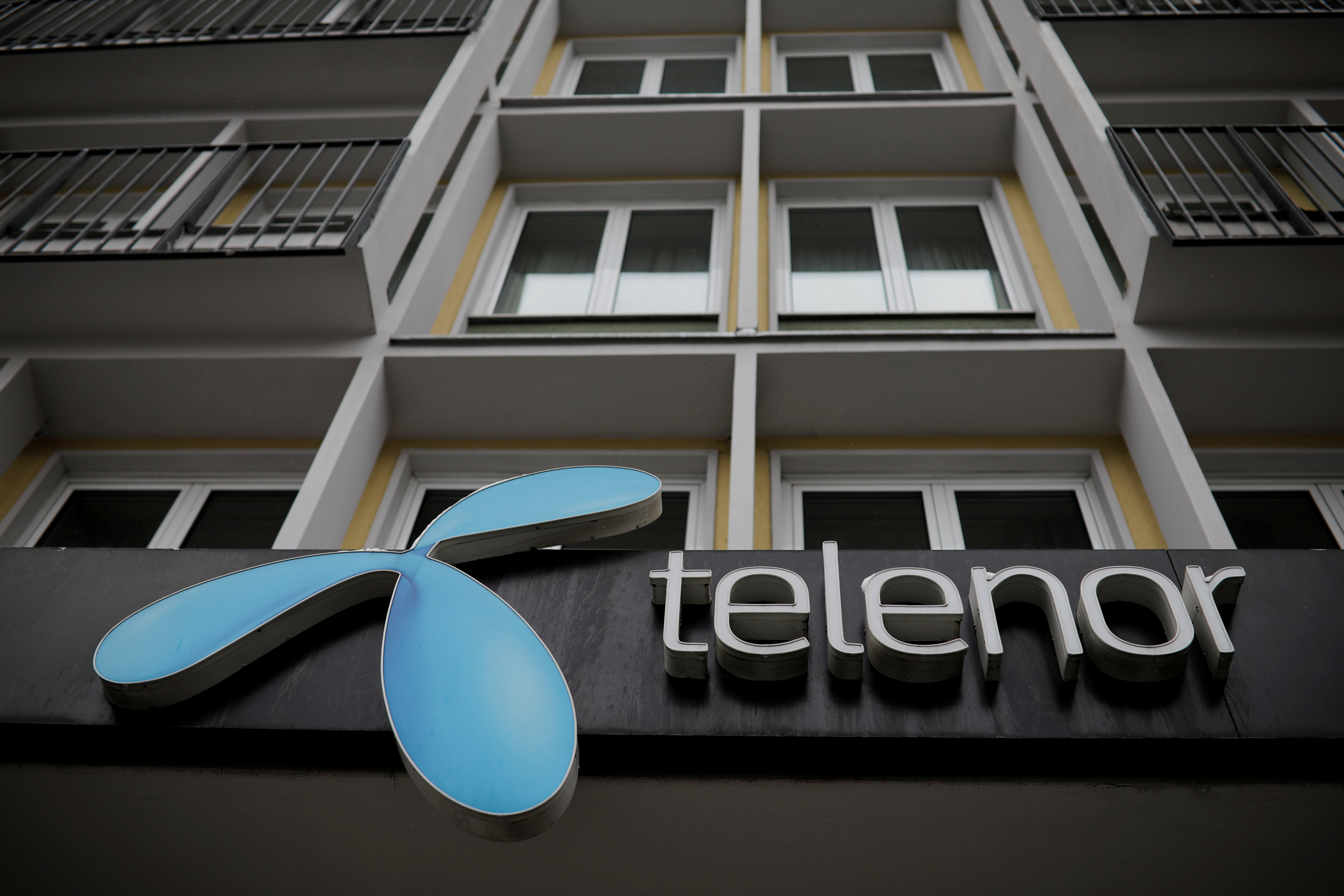 Telenor's logo is seen in central Belgrade