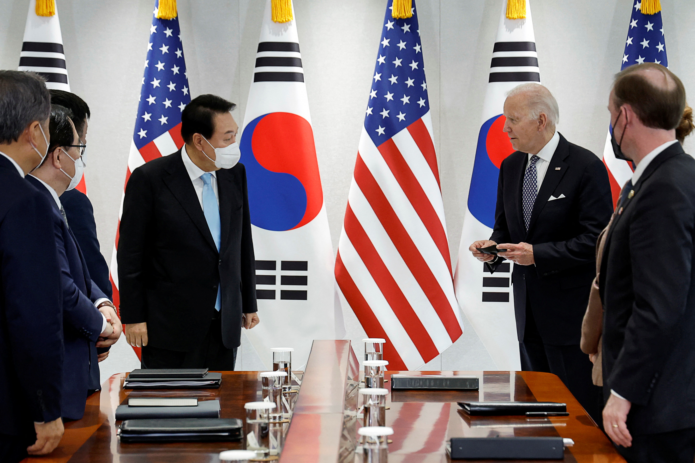 Biden, Yoon Vow To Deter North Korea And Offer COVID Aid | Reuters