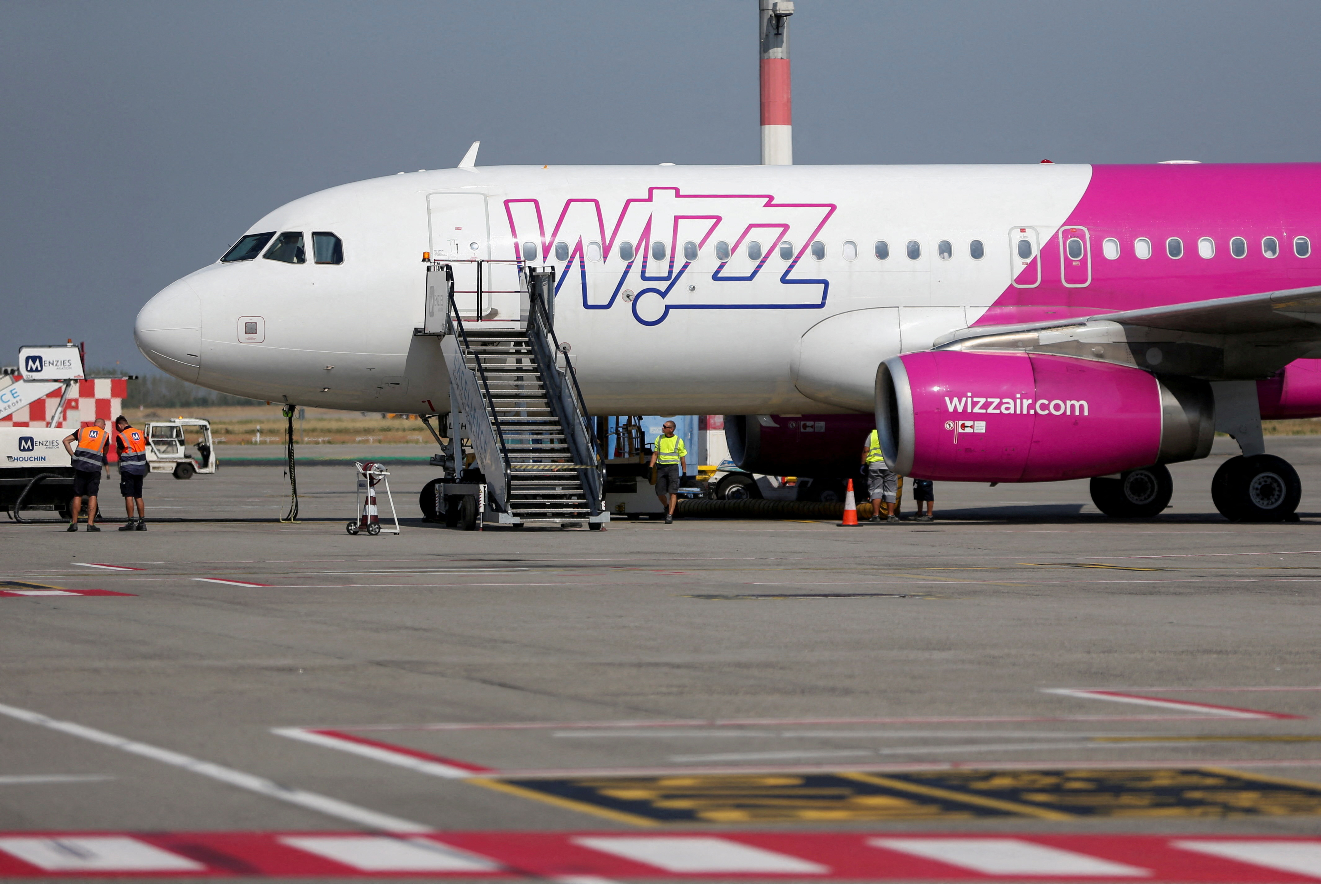Wizz Air's aircraft is parked on the tarmac at Ferenc Liszt International Airport in Budapest