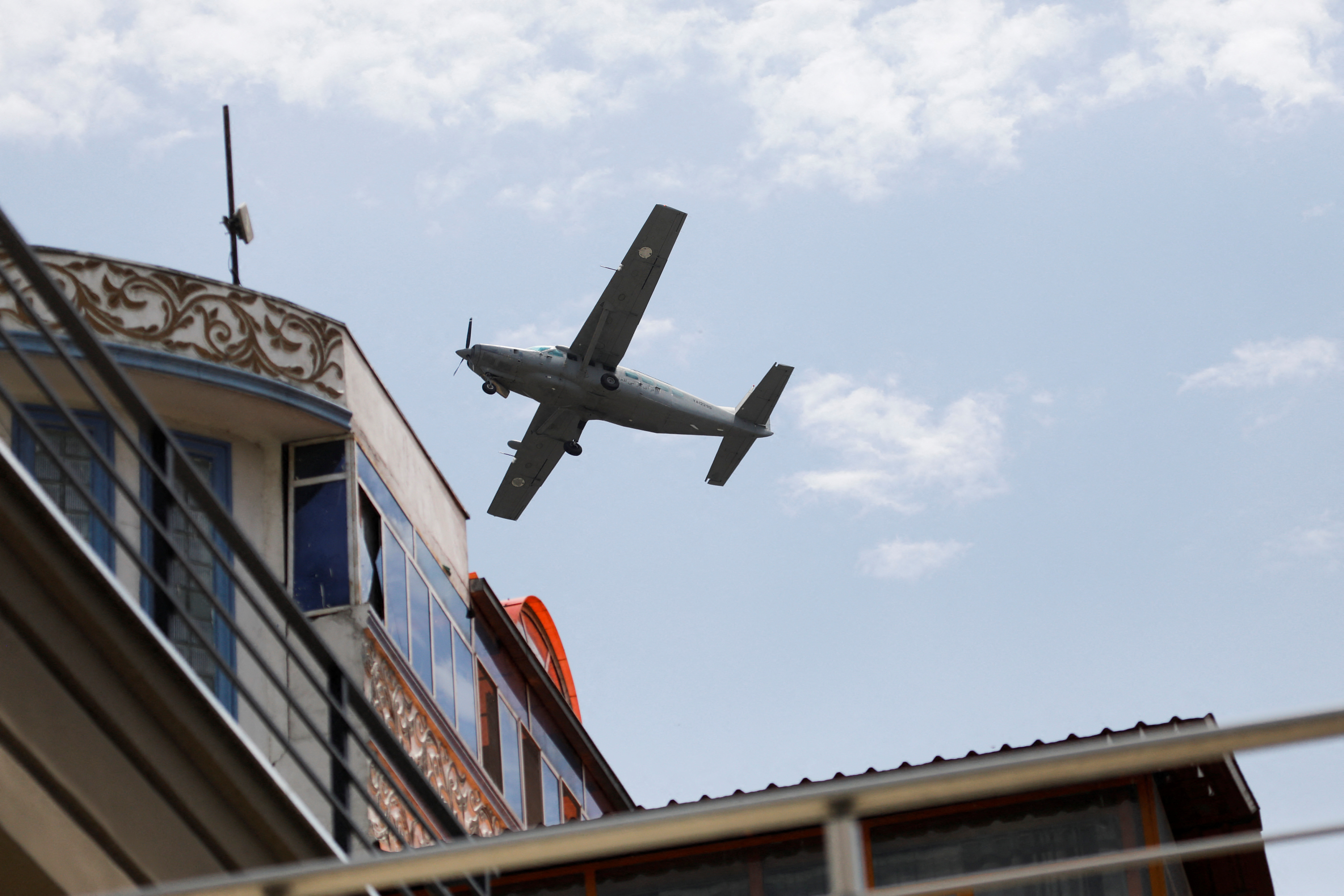 Taliban test repaired helicopters, planes in flyover of capital | Reuters