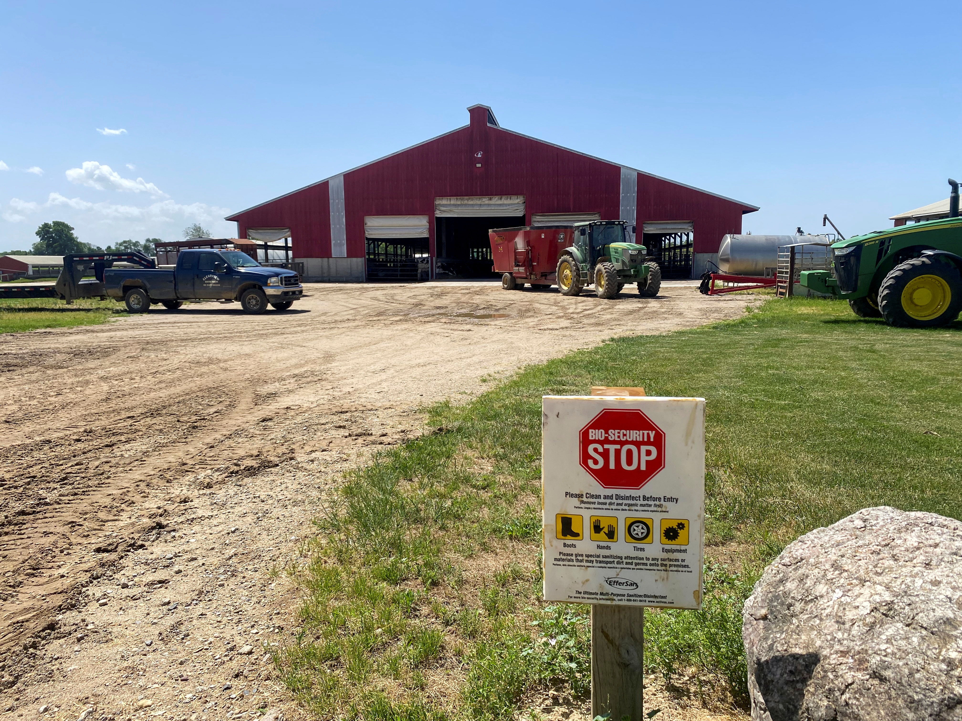 A warning sign is placed at a dairy farm in Martin, Michigan