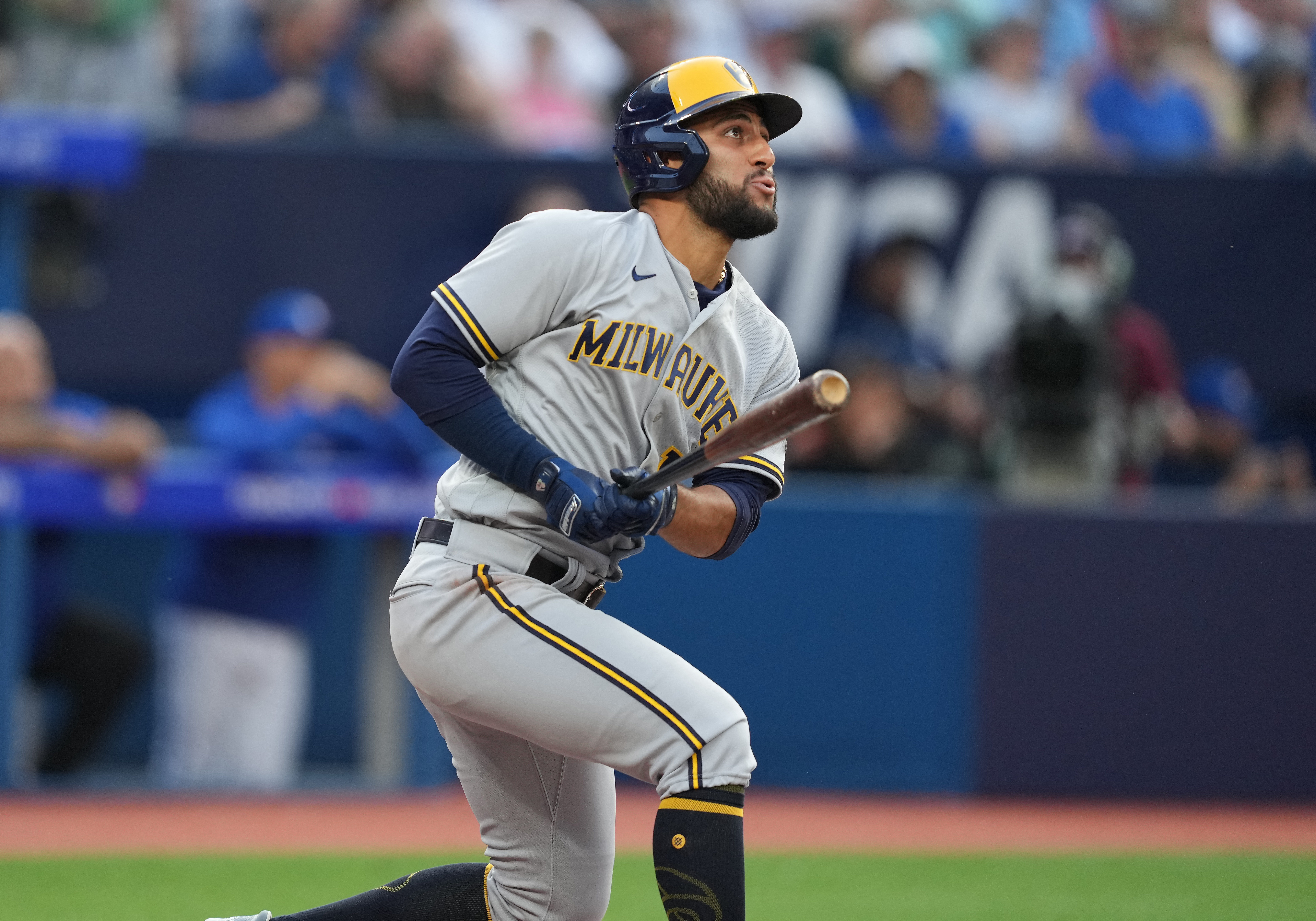 Milwaukee Brewers third baseman Abraham Toro runs after a grounder