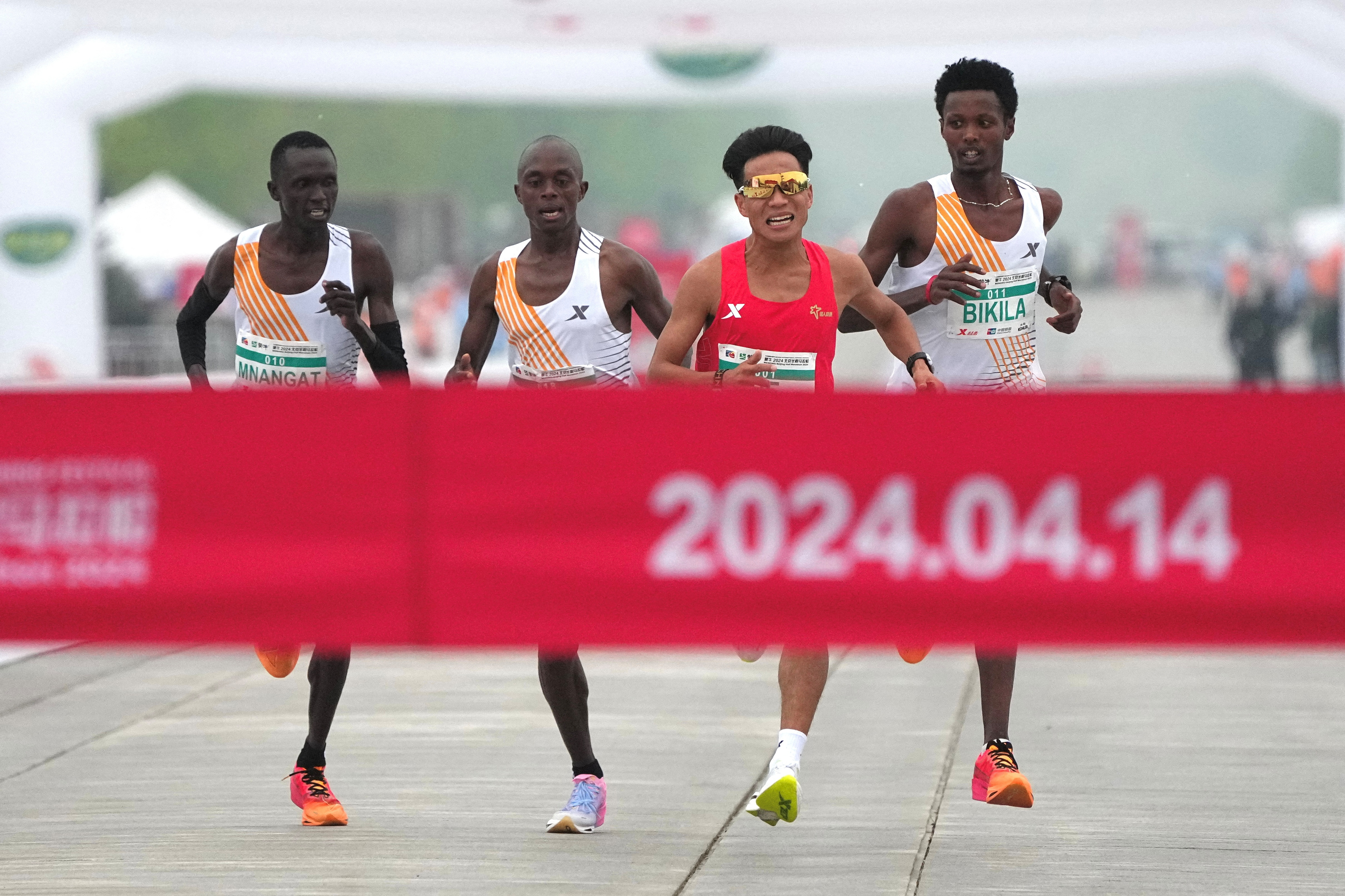 Online videos show Chinese runner being gifted win in Beijing half marathon