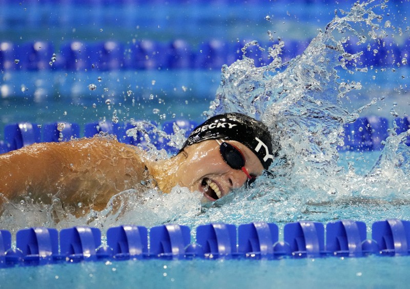 Ledecky takes care of business, books ticket to Tokyo | Reuters