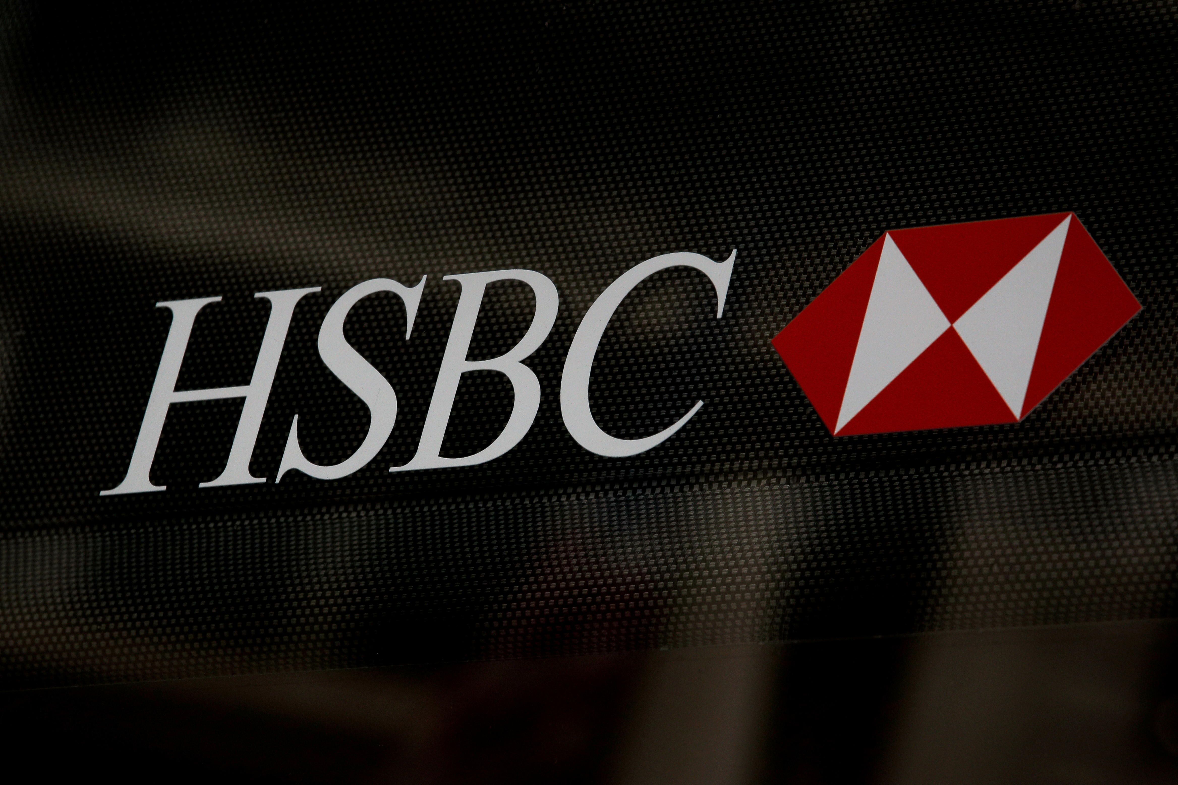 HSBC logo is seen on a branch bank in the financial district in New York, U.S., August 7, 2019. REUTERS/Brendan McDermid/
