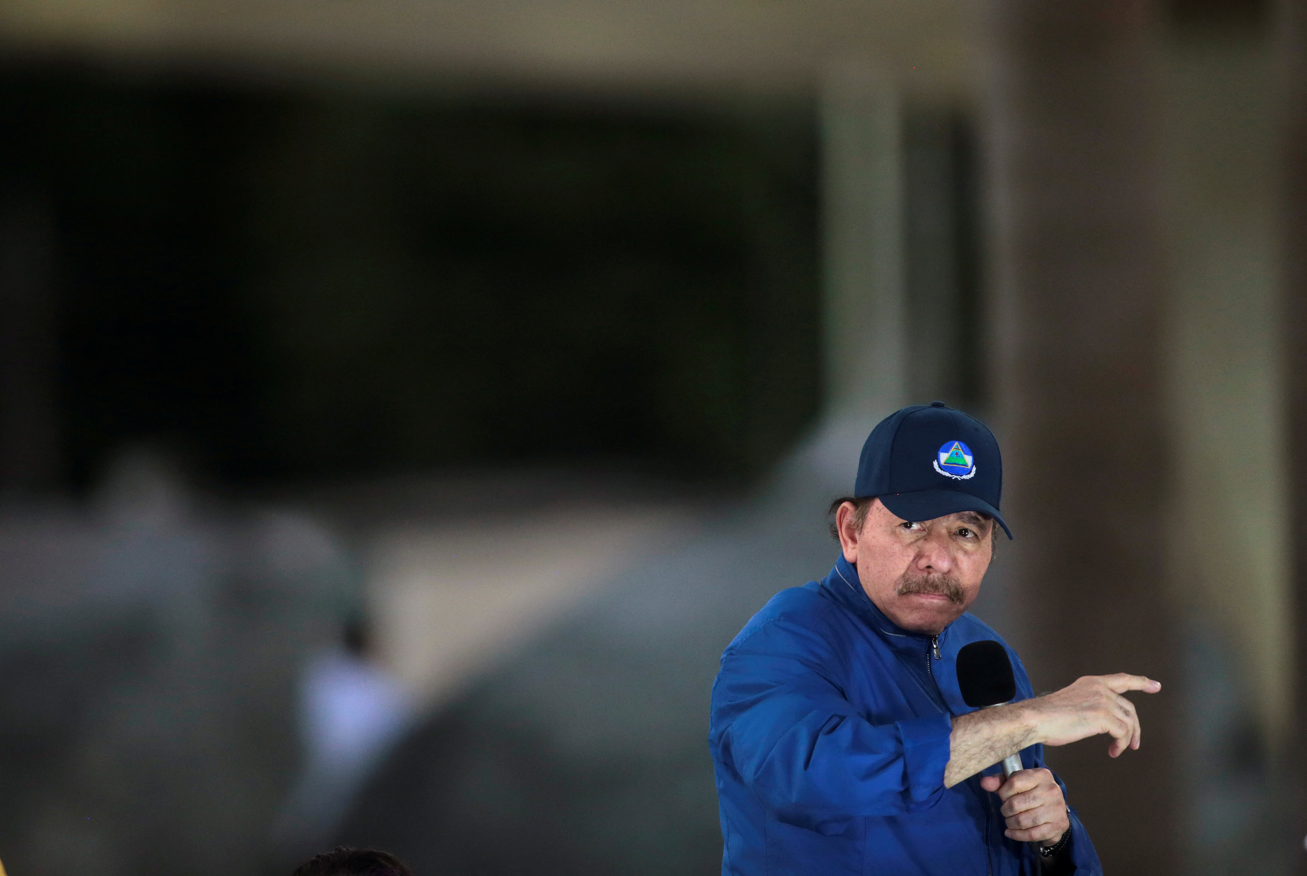 Nicaraguan President Daniel Ortega speaks to supporters during the opening ceremony of a highway overpass in Managua