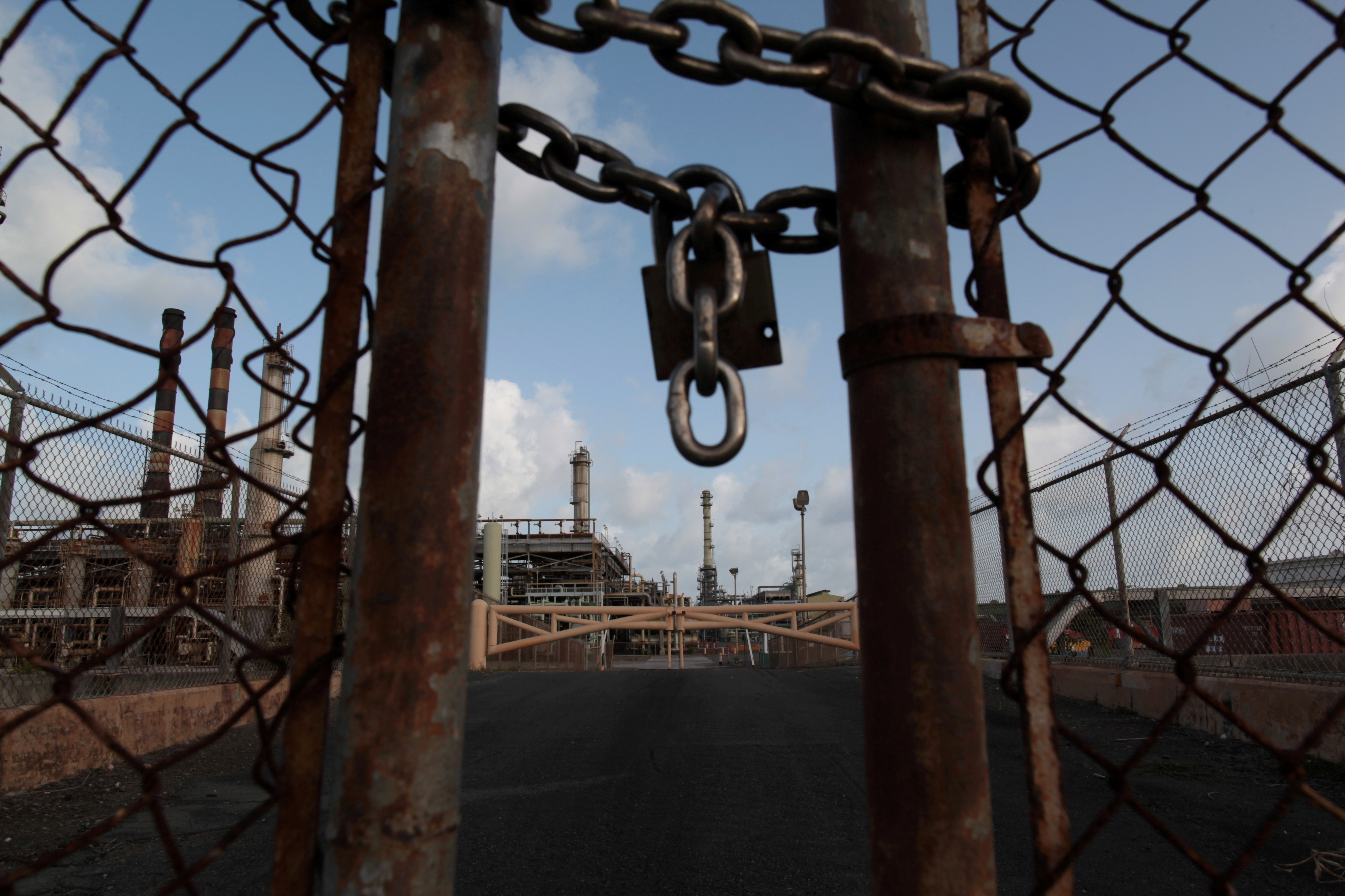 The installations of the St Croix refinery are seen behind a locked gate in St Croix