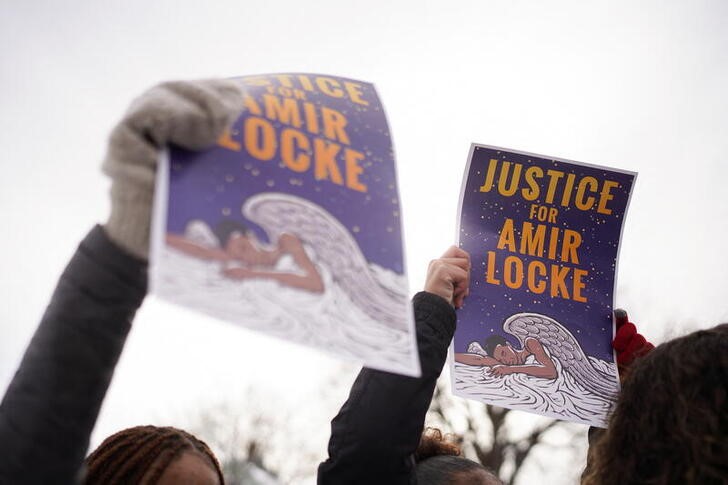 Students participate in at a state-wide walkout for Amir Locke in Saint Paul