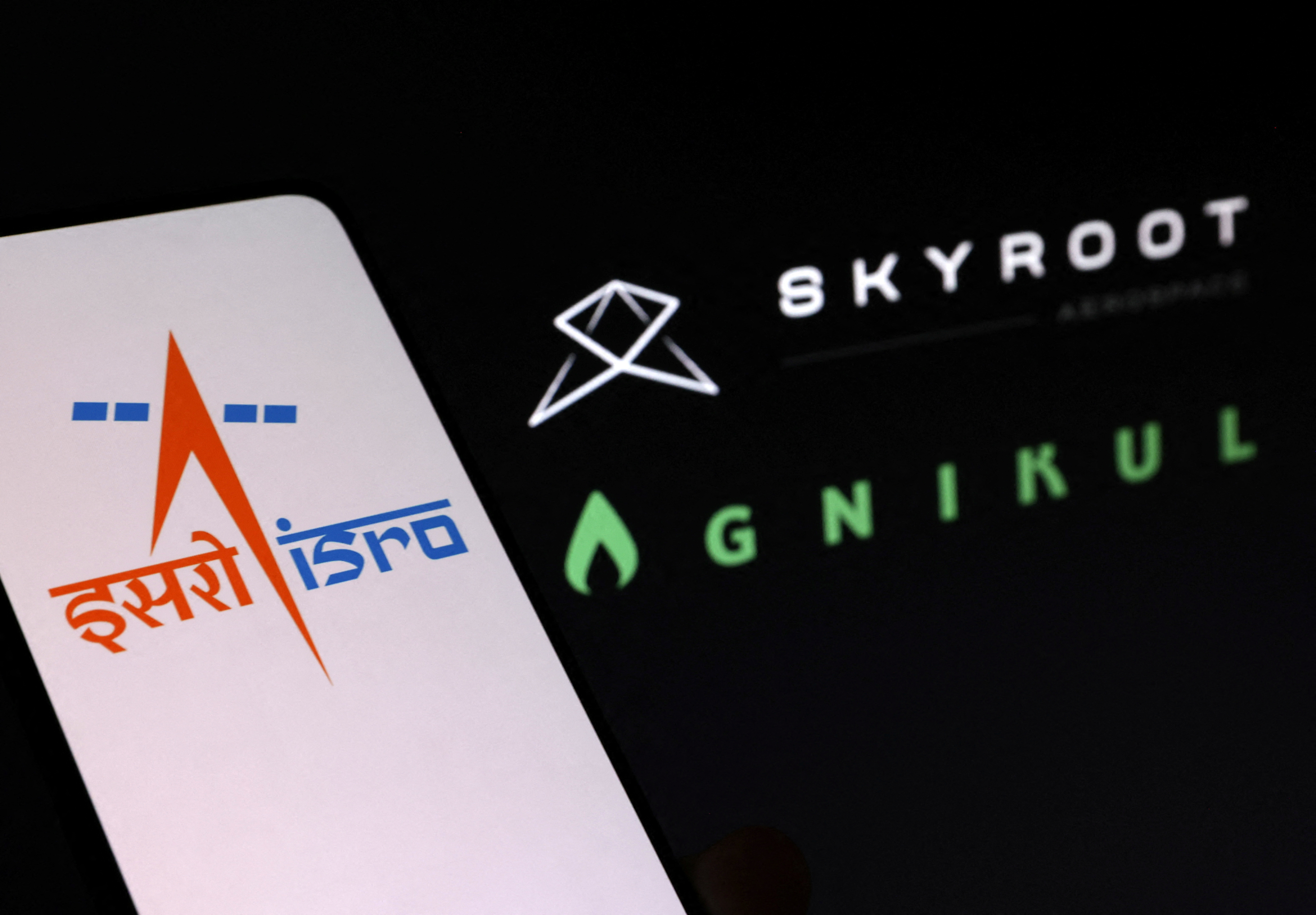 Illustration shows Indian Space Research Organization, Skyroot Aerospace and Agnikul Cosmos logos