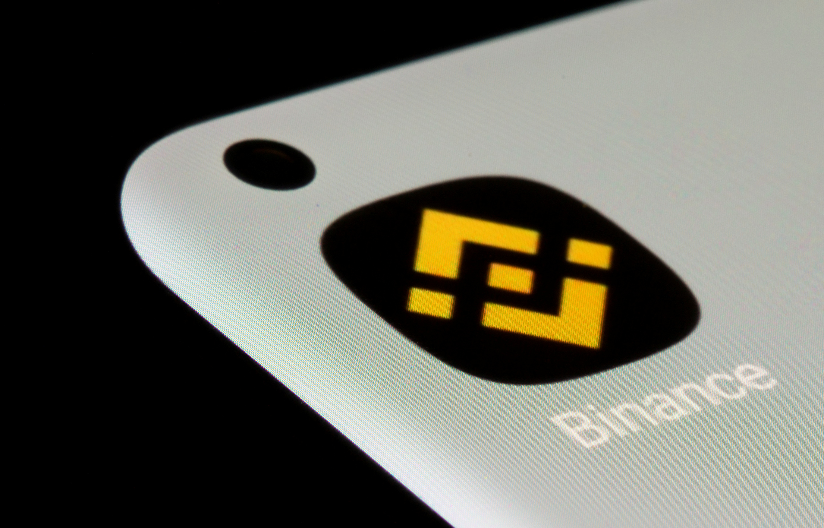 Binance app is seen on a smartphone in this illustration