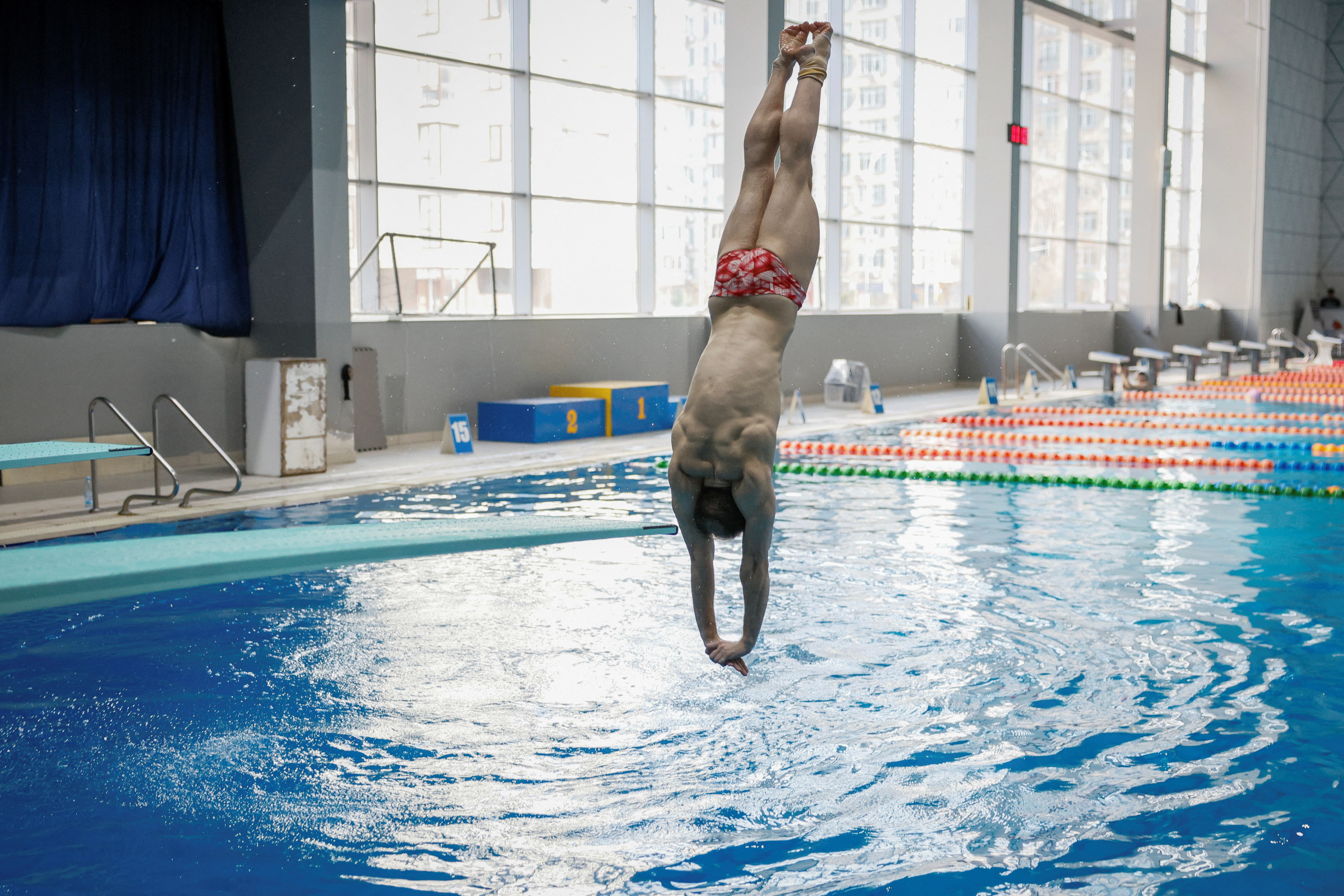 European diving champion from Mariupol Stanislav Oliferchyk attends a training session in Kyiv
