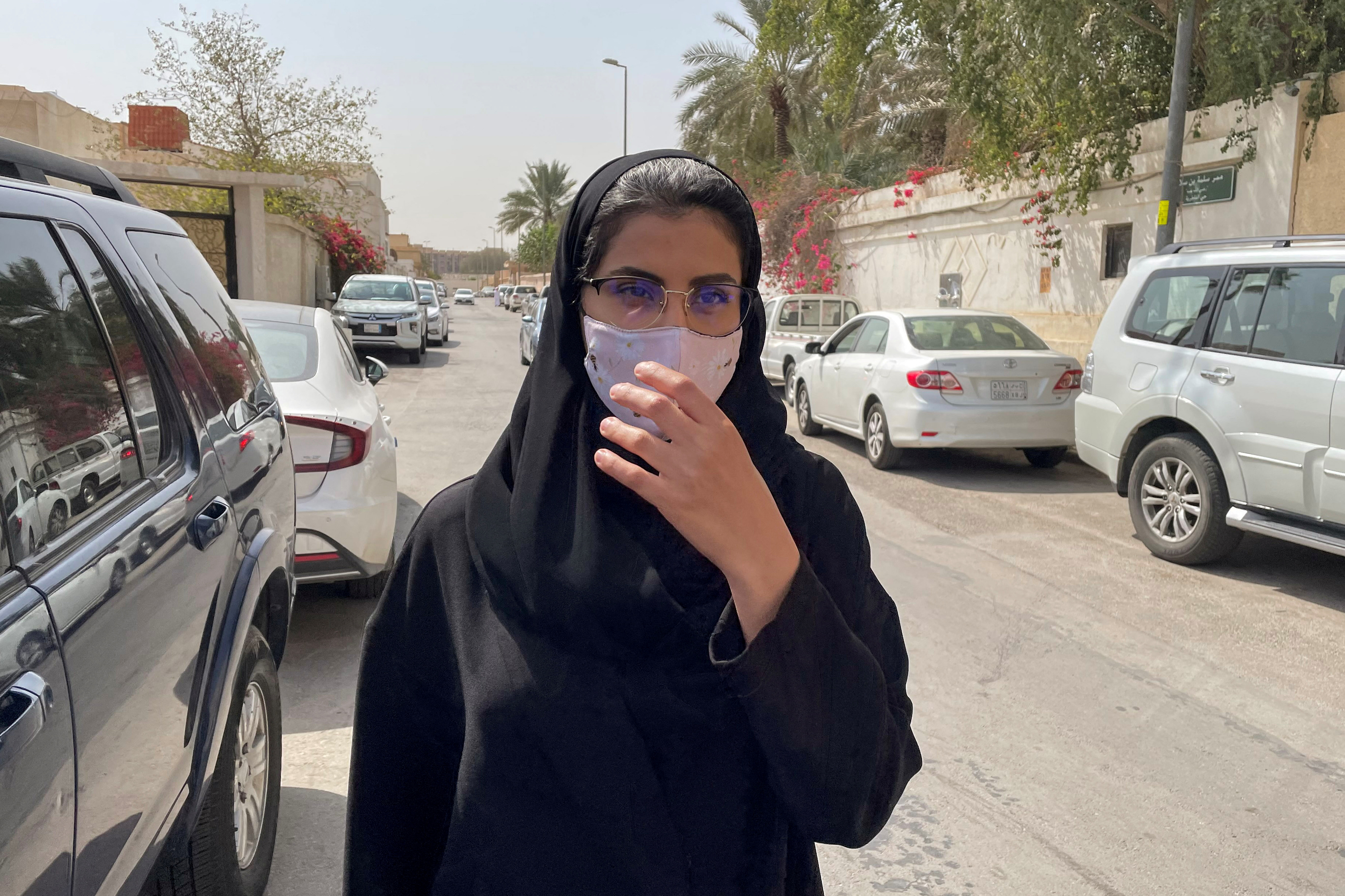 Saudi activist Loujain Al-Hathloul makes her way to appear at a special criminal court for an appeals hearing, in Riyadh