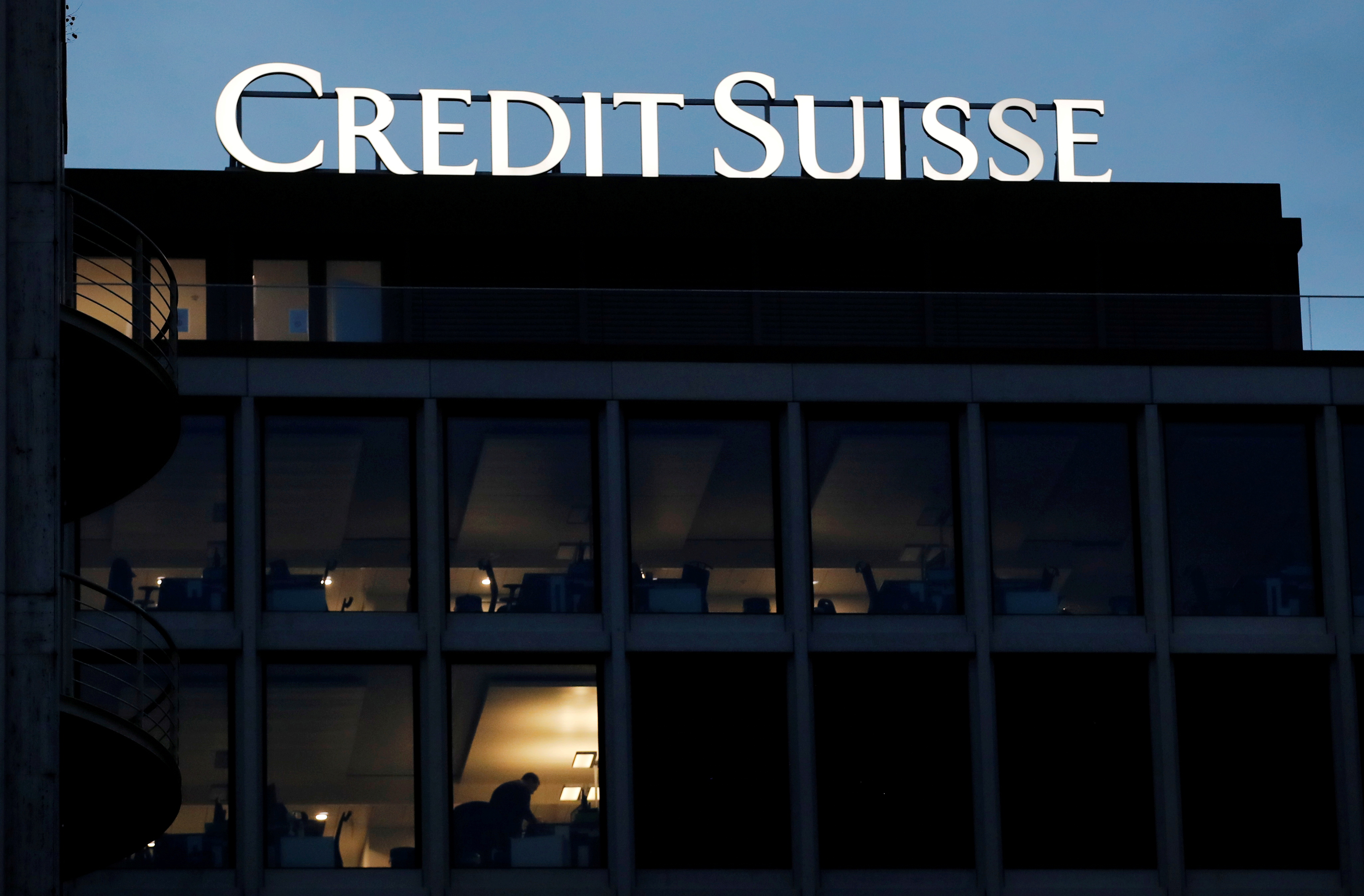 A logo of Credit Suisse is pictured on a building in Geneva