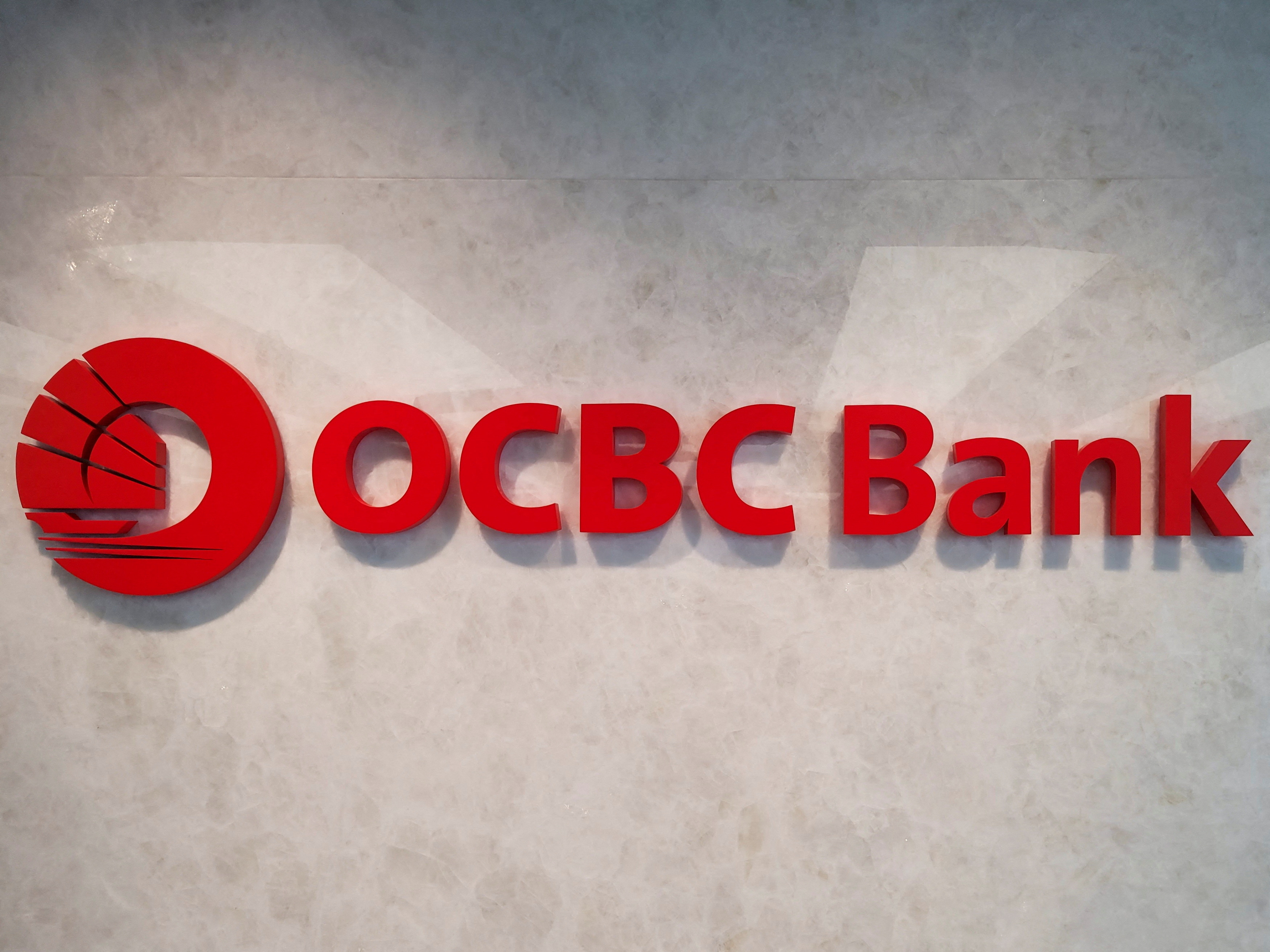 The OCBC Bank logo is seen outside its headquarters after the bank reported its first-half results, in Singapore