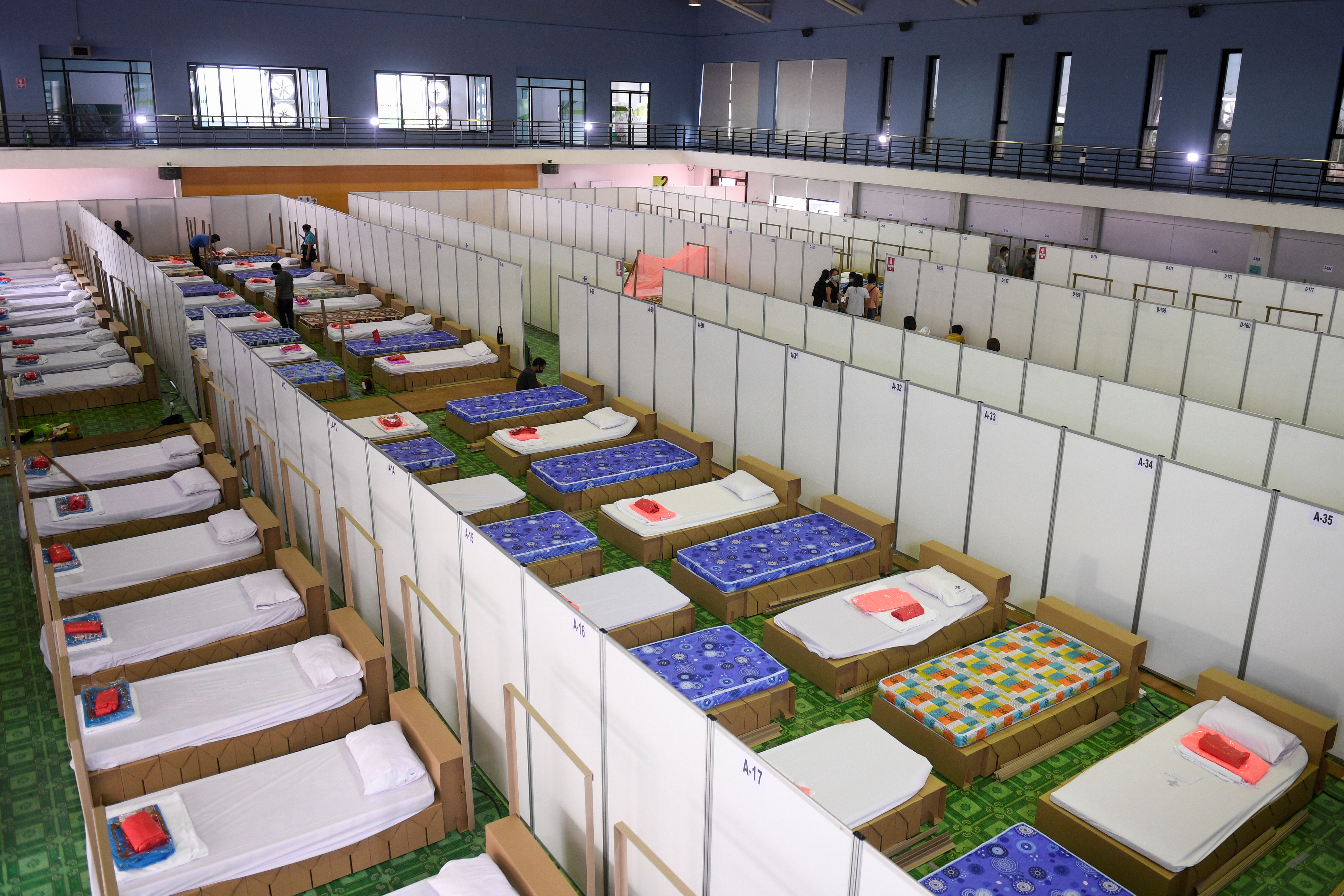 Empty beds are seen inside a field hospital recently set up to fight the spread of the coronavirus disease (COVID-19) as the country deals with a fresh wave of infections after tackling earlier outbreaks, in Bangkok, Thailand, April 12, 2021. REUTERS/Chalinee Thirasupa