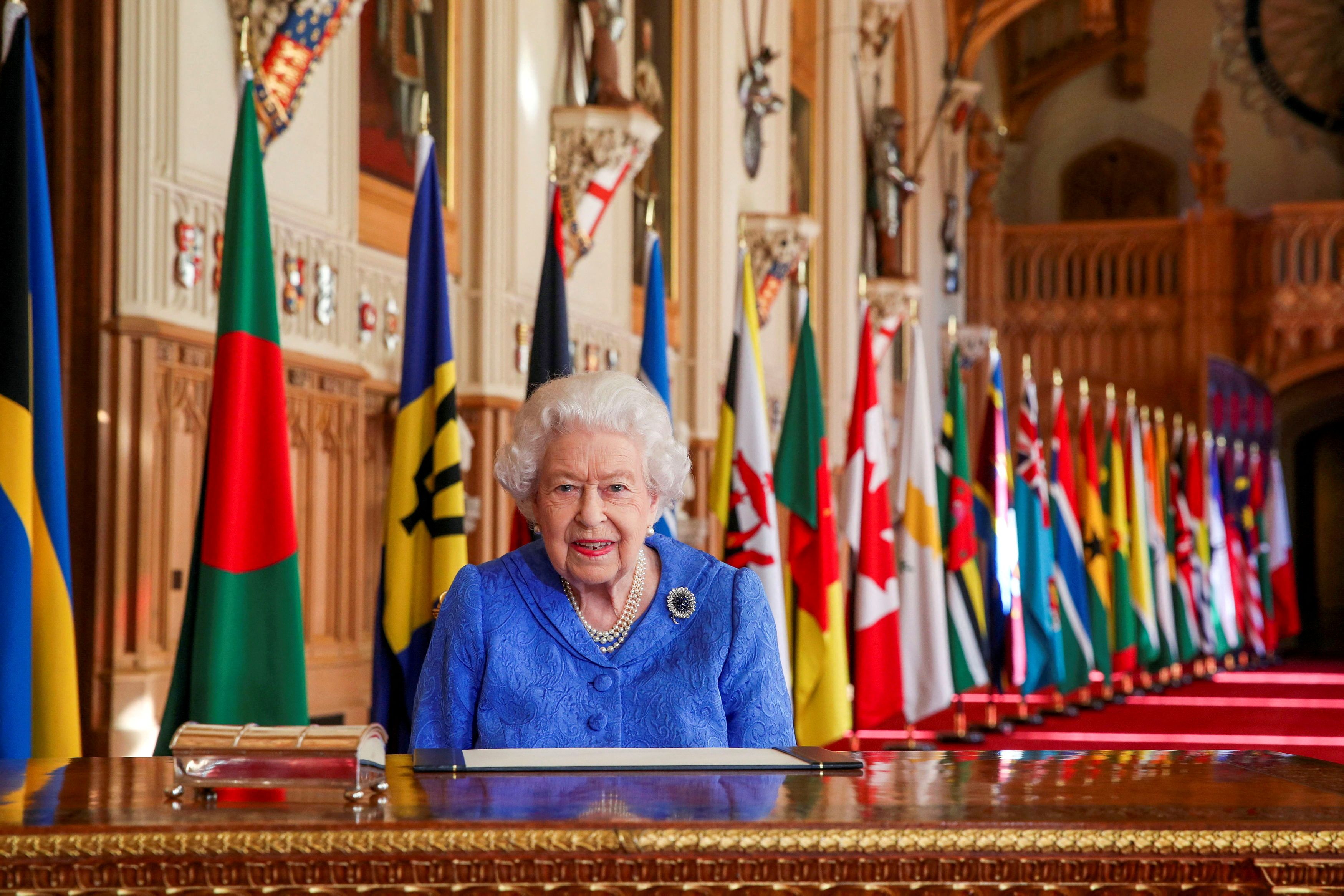 Britain's Queen Elizabeth II signs her annual Commonwealth Day message at Windsor Castle, Britain