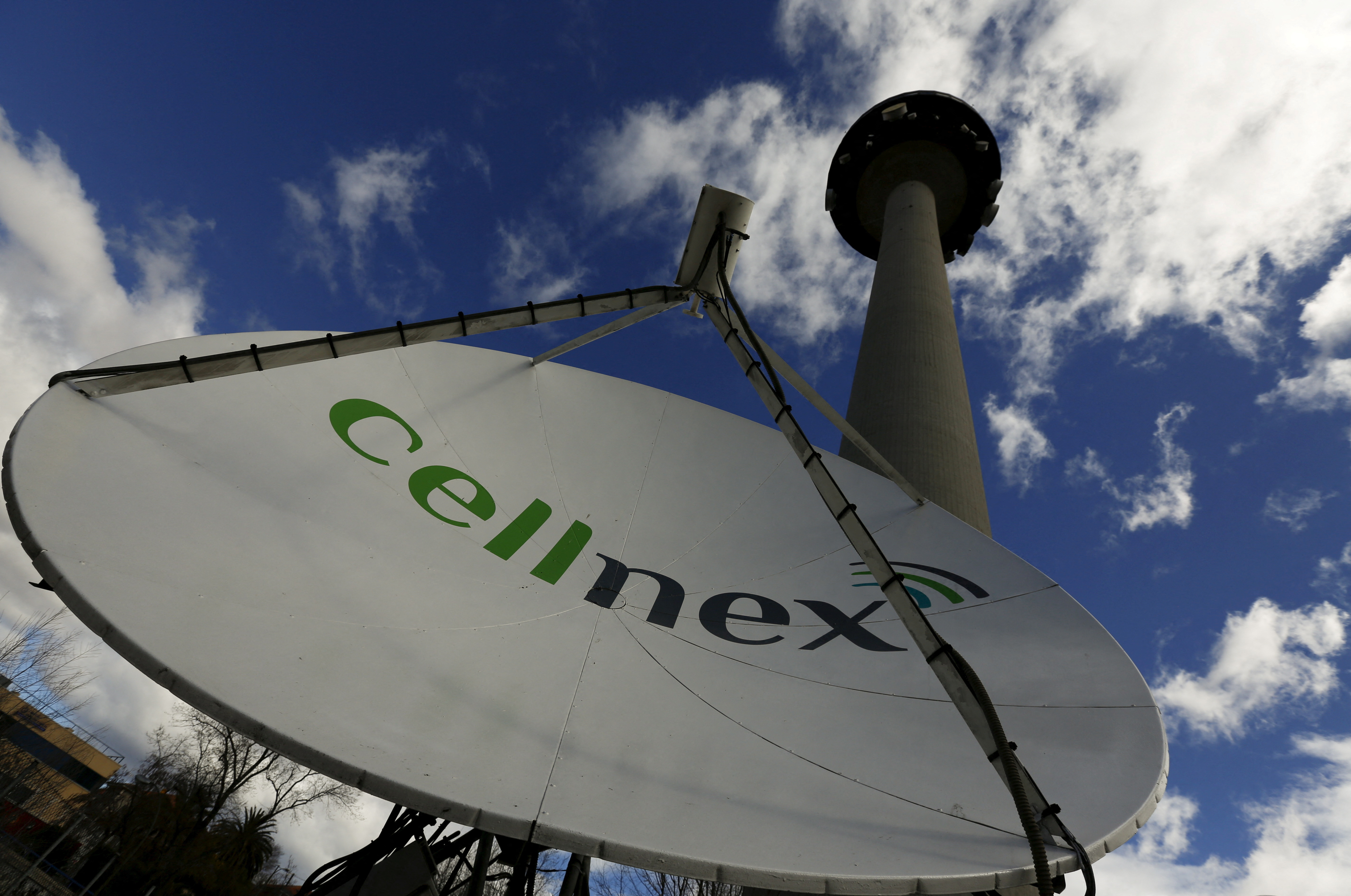 A telecom antenna of Spain's telecoms infrastructures firm Cellnex are seen under main telecom tower, known as 