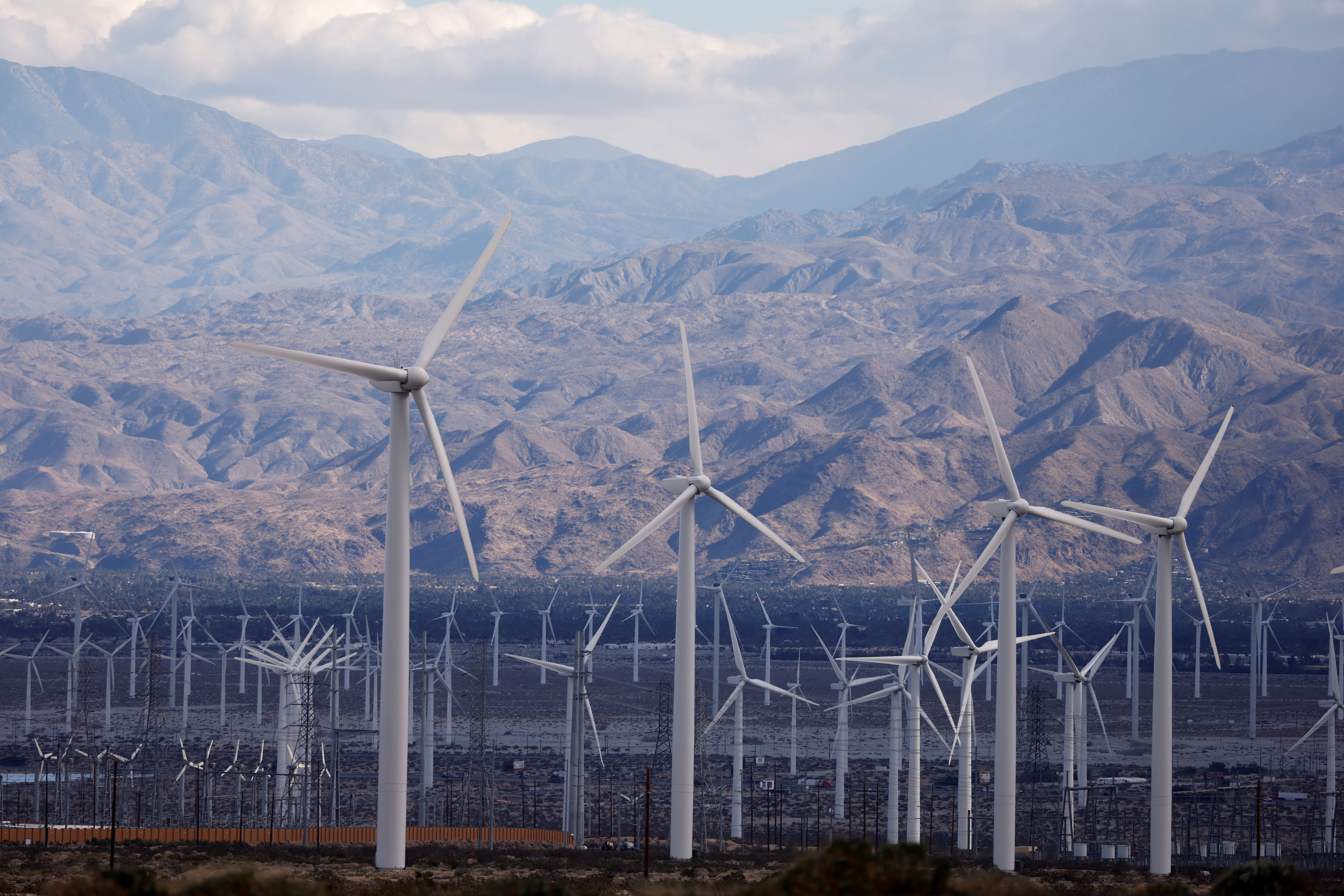 Wind turbines spin during a winter storm near Palm Springs, California