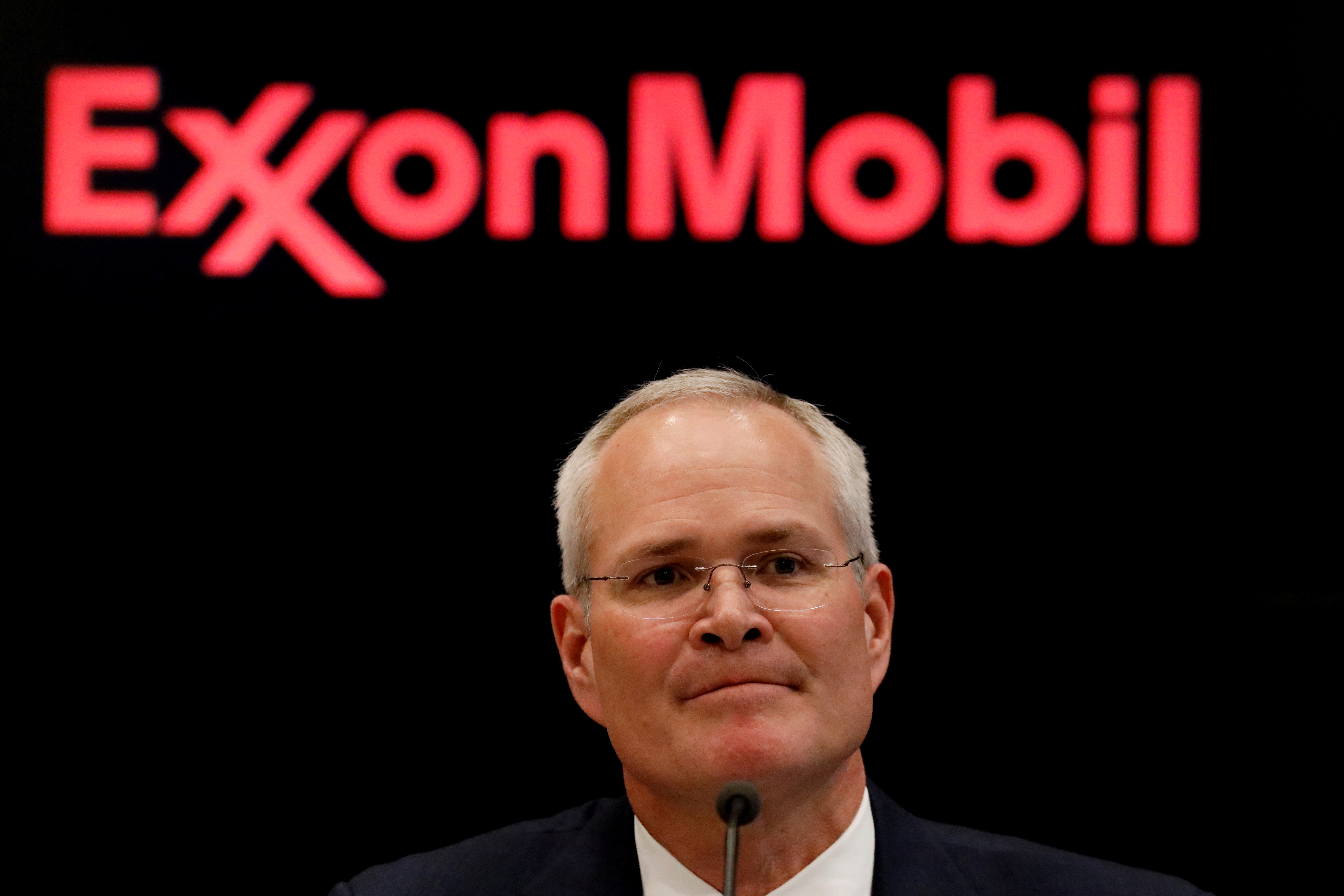 uFILE PHOTO: Darren Woods, Chairman & CEO, Exxon Mobil Corporation attends a news conference at the NYSE
