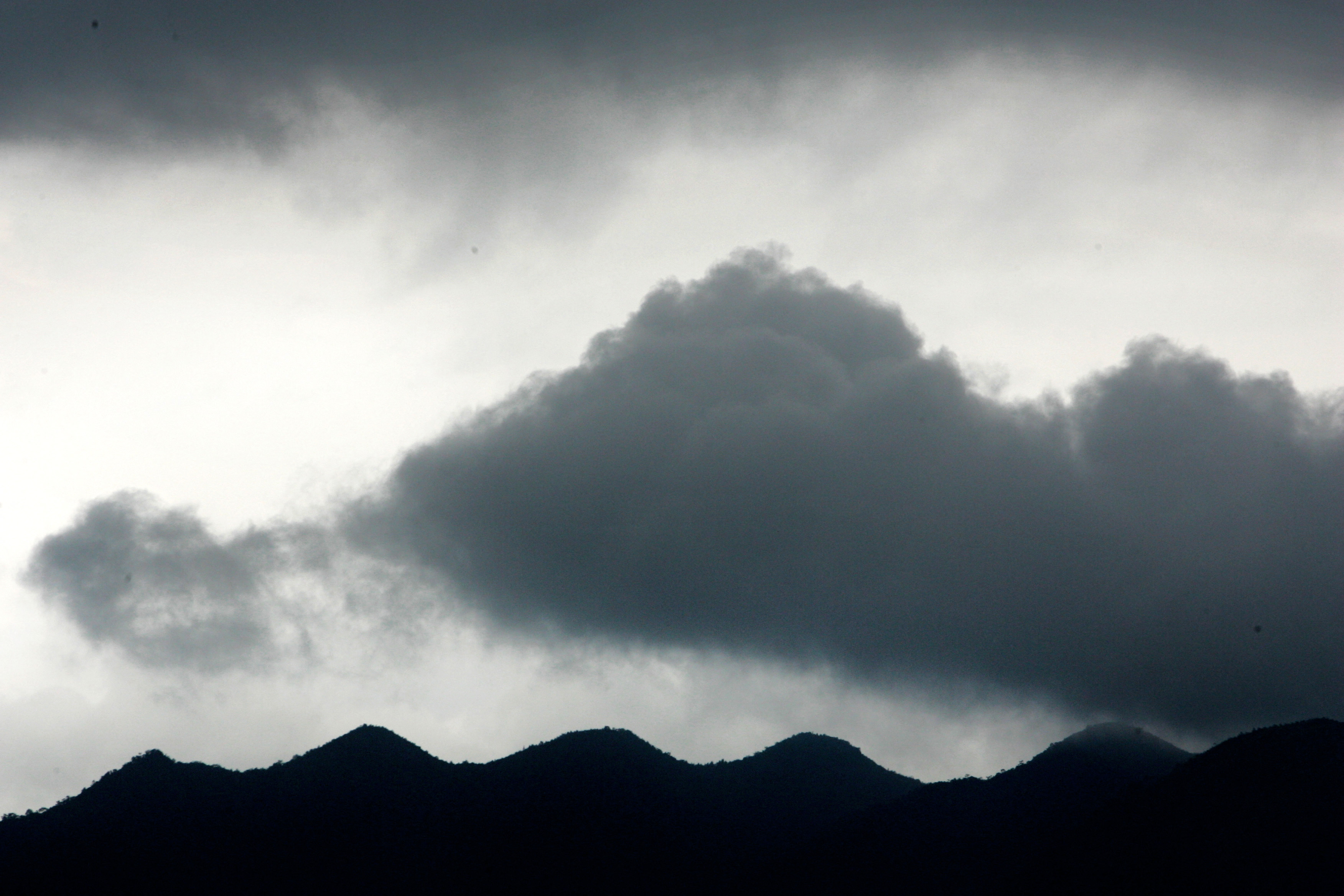 Dark clouds gather over mountains in Zhaoqing, southern China's Guangdong province.