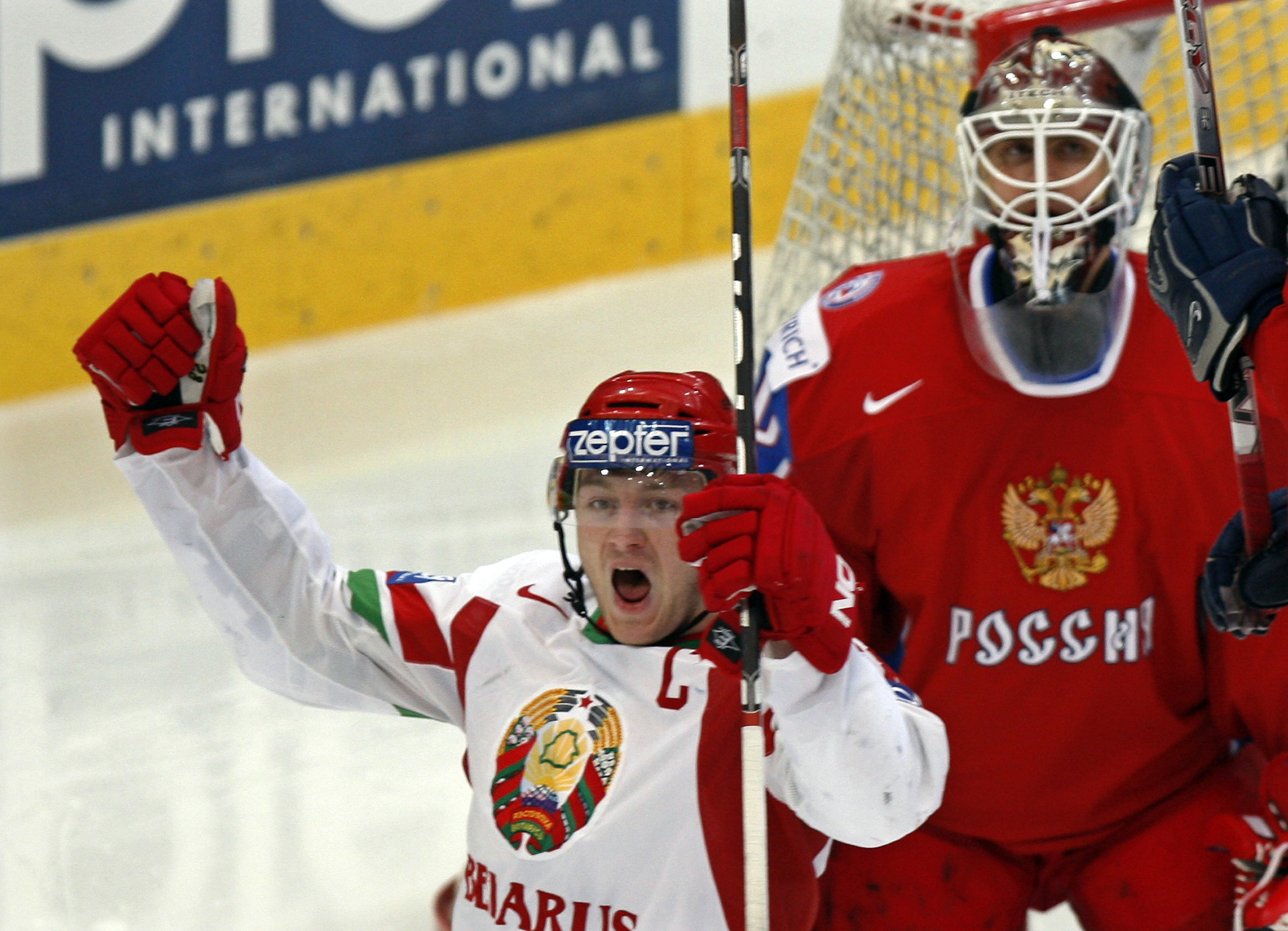 Belarus'  Koltsov celebrates goal against Russia during their IIHF World Hockey Championship quarterfinal game in Bern