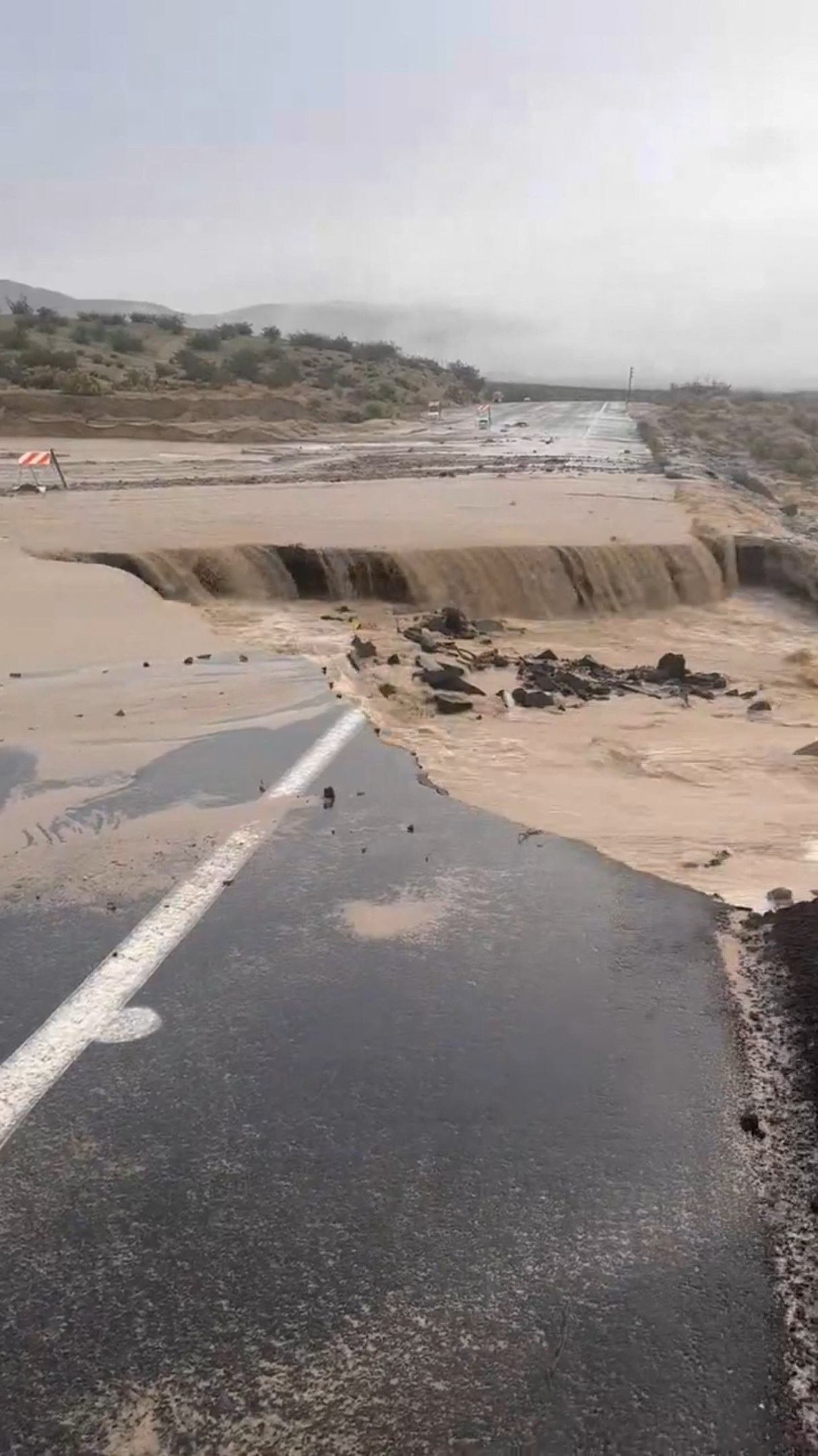 Lingering atmospheric river soaks California, threatening more flooding ...