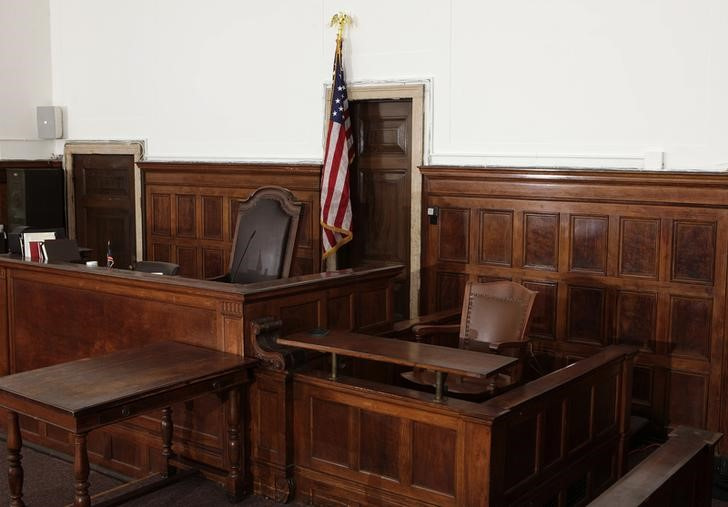 The judge's chair, the witness stand and stenographer's desk are seen in court room 422 of the New York Supreme Court