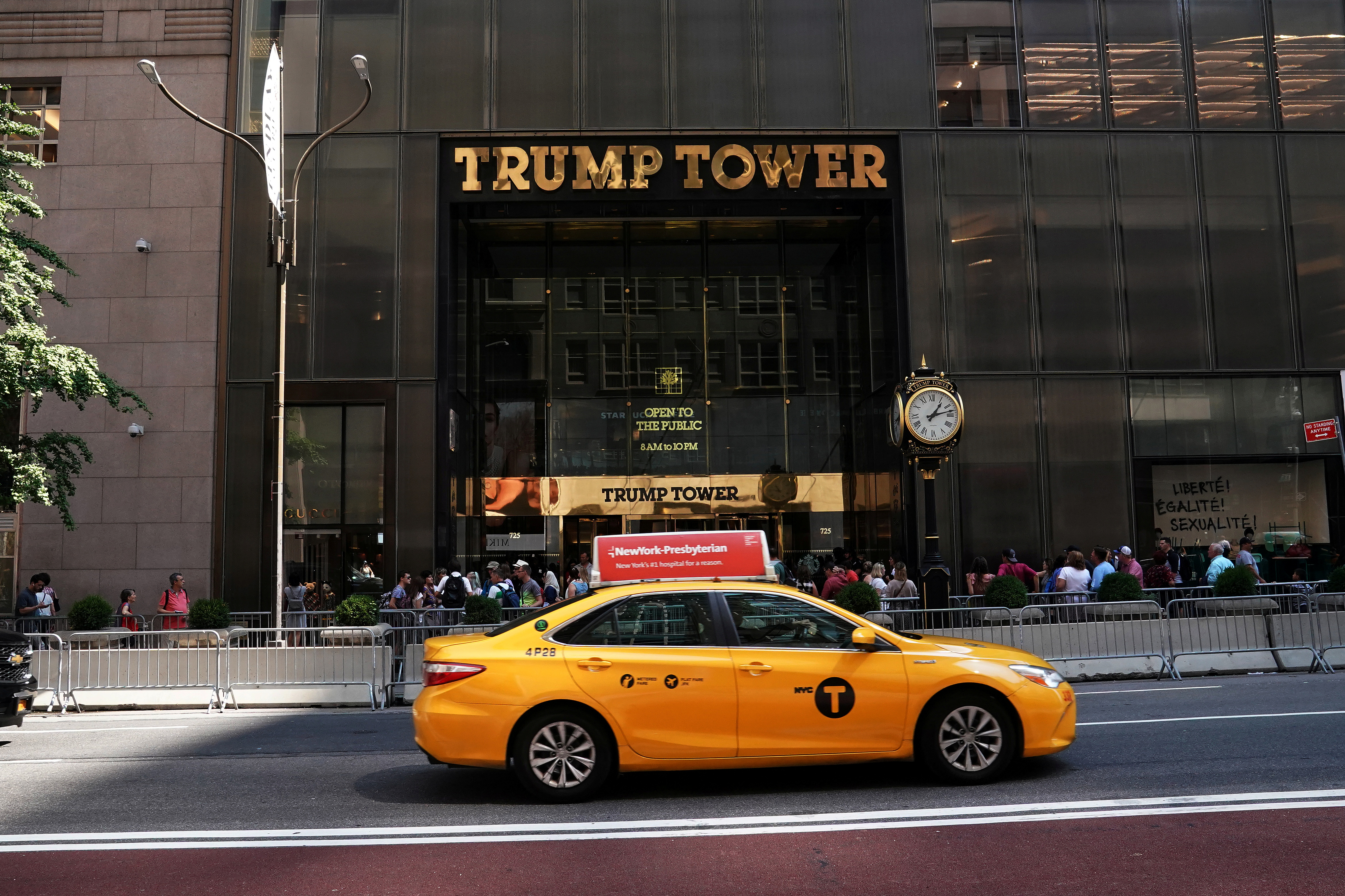 A taxi goes past Trump Tower in New York City
