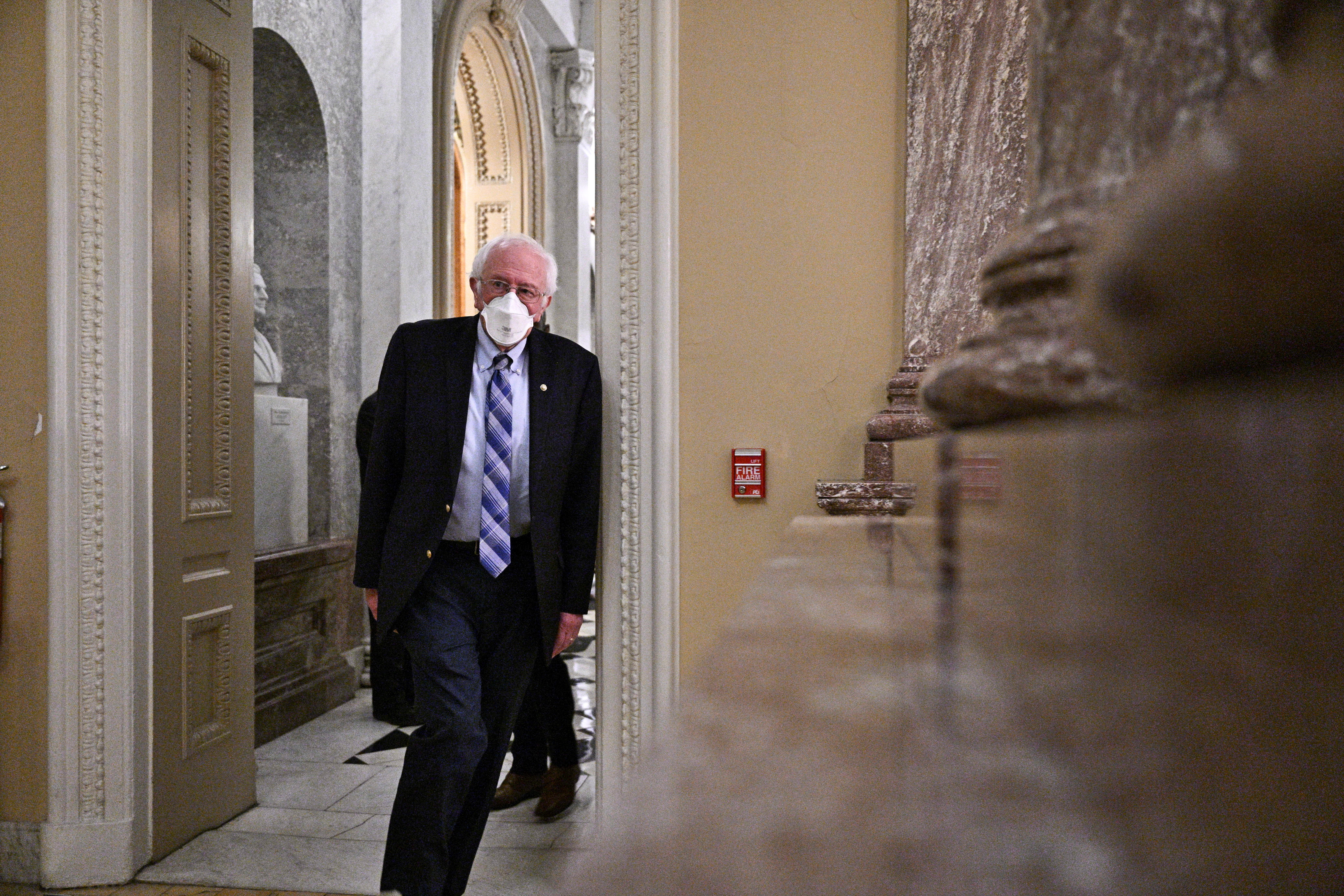 U.S. Senator Bernie Sanders (I-VT) leaves after voting on an amendment to the Continuing Resolution that averted a shutdown of the federal government, at the U.S. Capitol in Washington