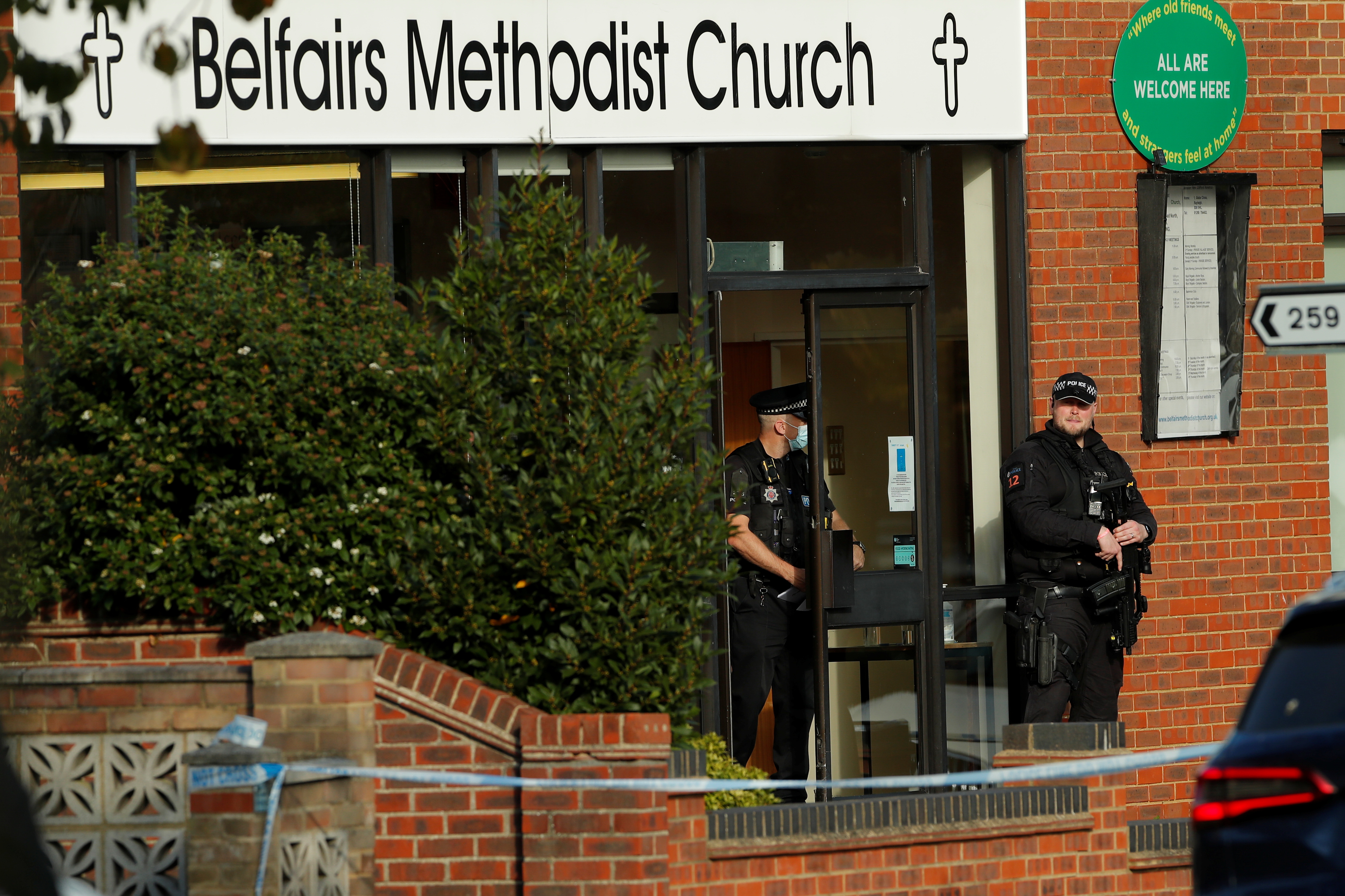 Police officers are seen at the scene where MP David Amess was stabbed during constituency surgery, in Leigh-on-Sea, Britain October 15, 2021. REUTERS/Andrew Couldridge